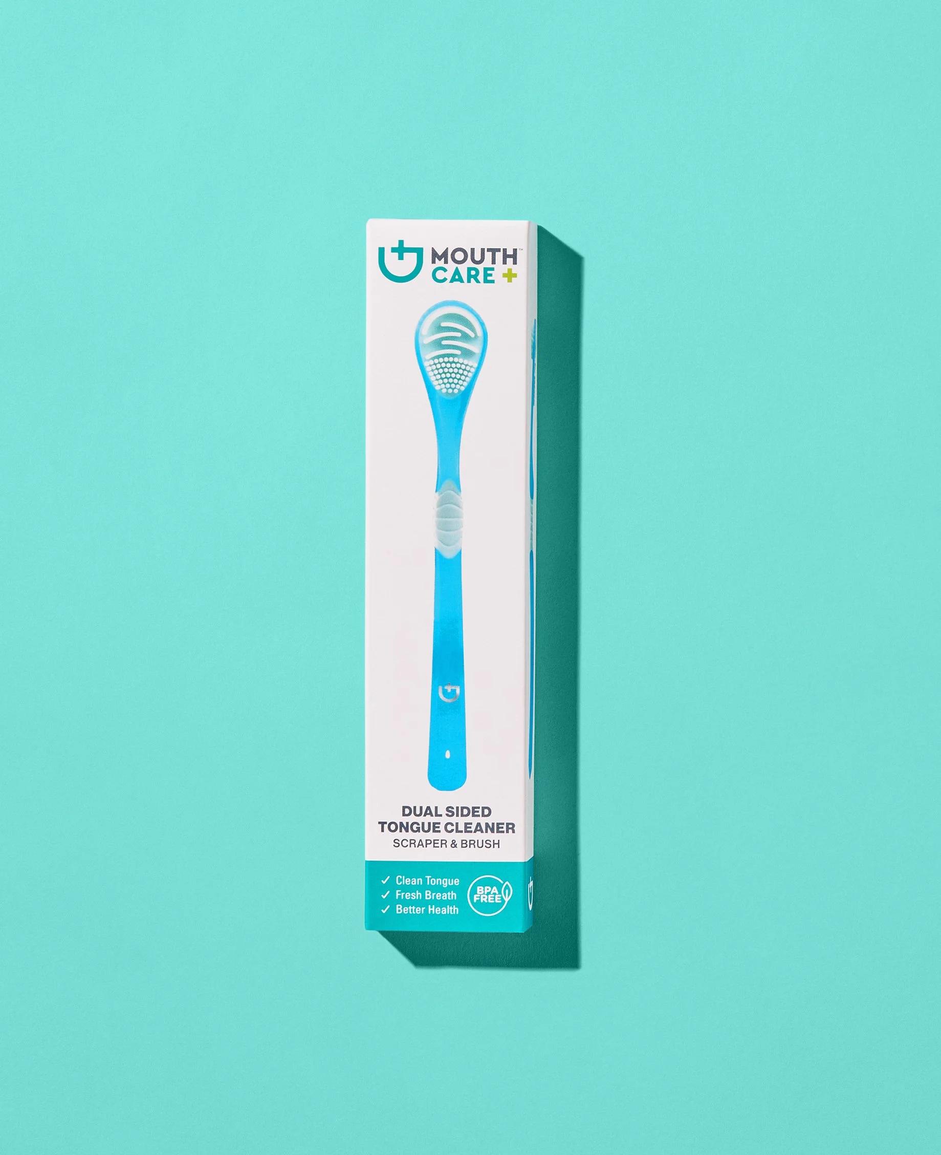 Blue dual-sided tongue cleaner with scraper and brush, in white and blue packaging, on a teal background.