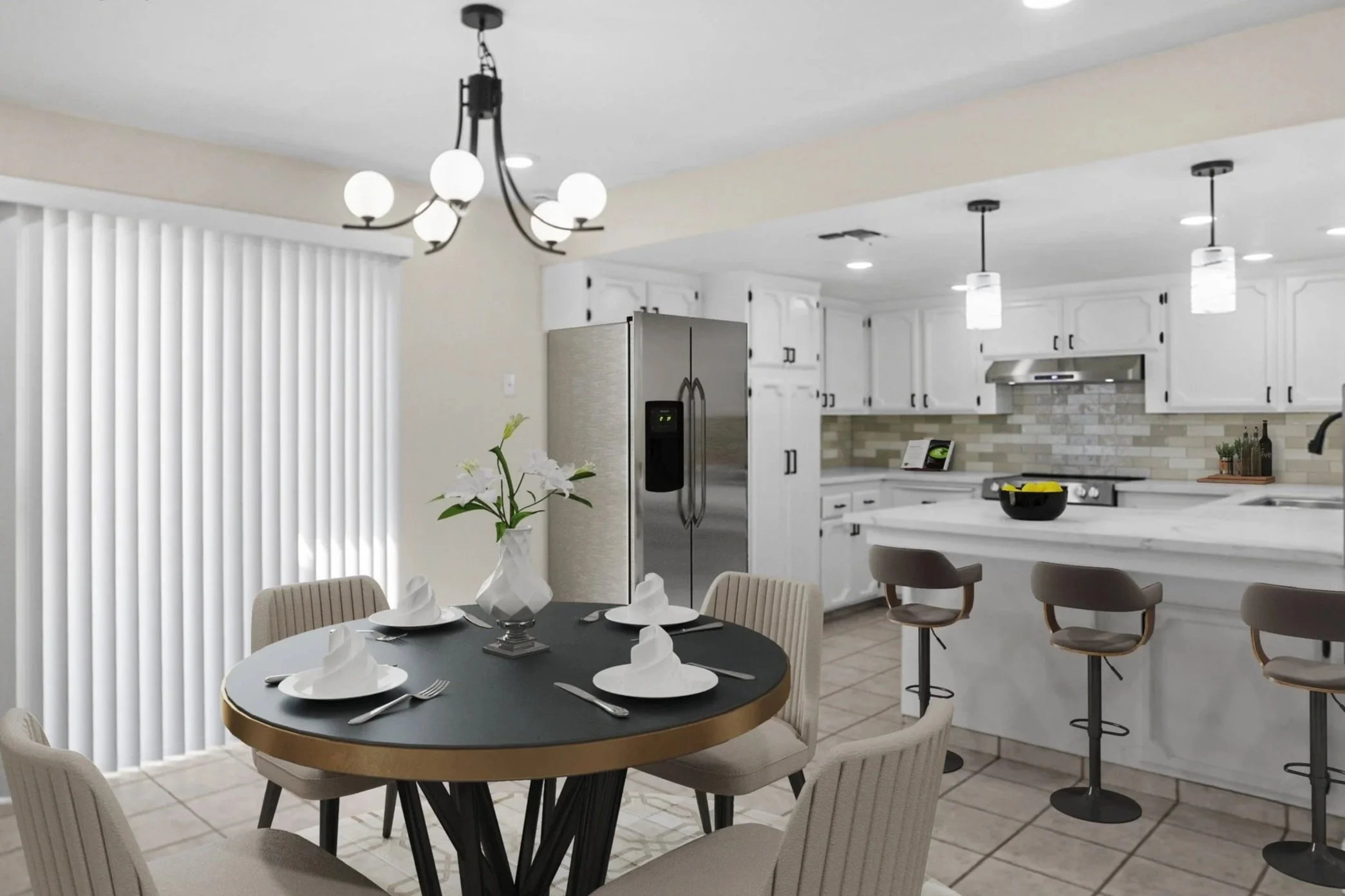 Modern kitchen with white cabinets, stainless steel refrigerator, and beige tiled backsplash. An island with bar stools is visible, and there is a round dining table with chairs set for a meal. Overhead lighting fixtures are present, and a sliding gl