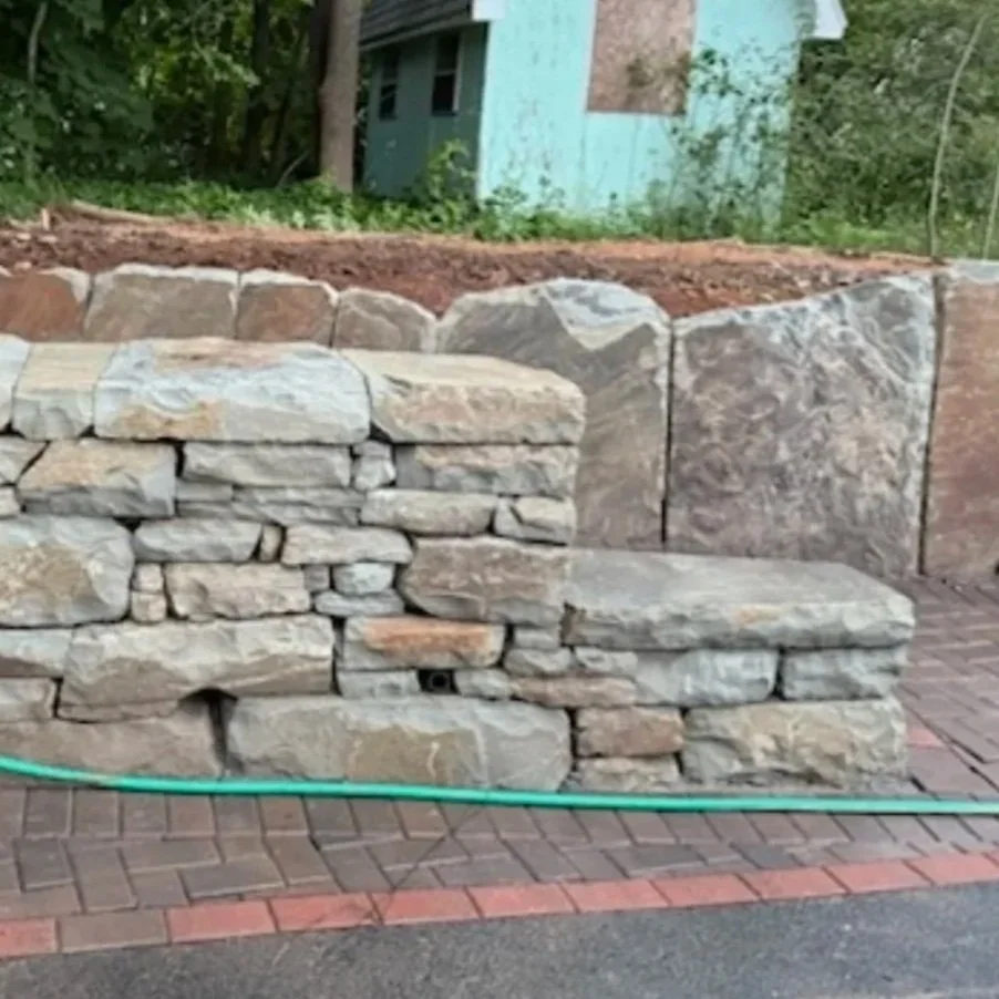 Geometric drawing of an outline square with sections divided by vertical, horizontal, and diagonal lines.