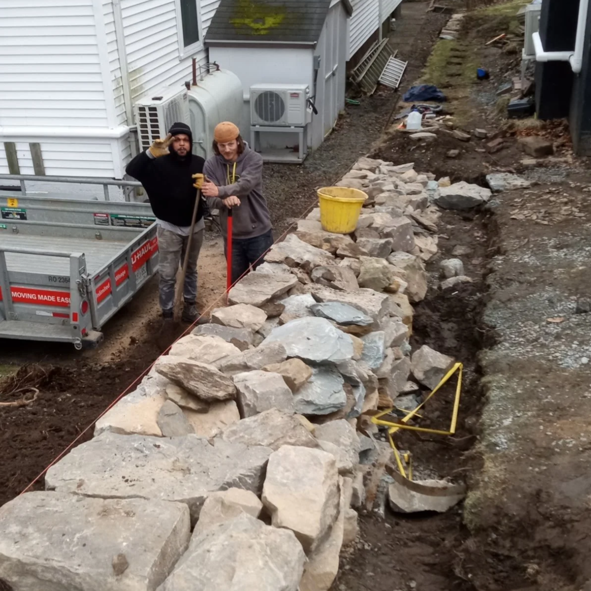 Geometric drawing of an outline square with sections divided by vertical, horizontal, and diagonal lines.