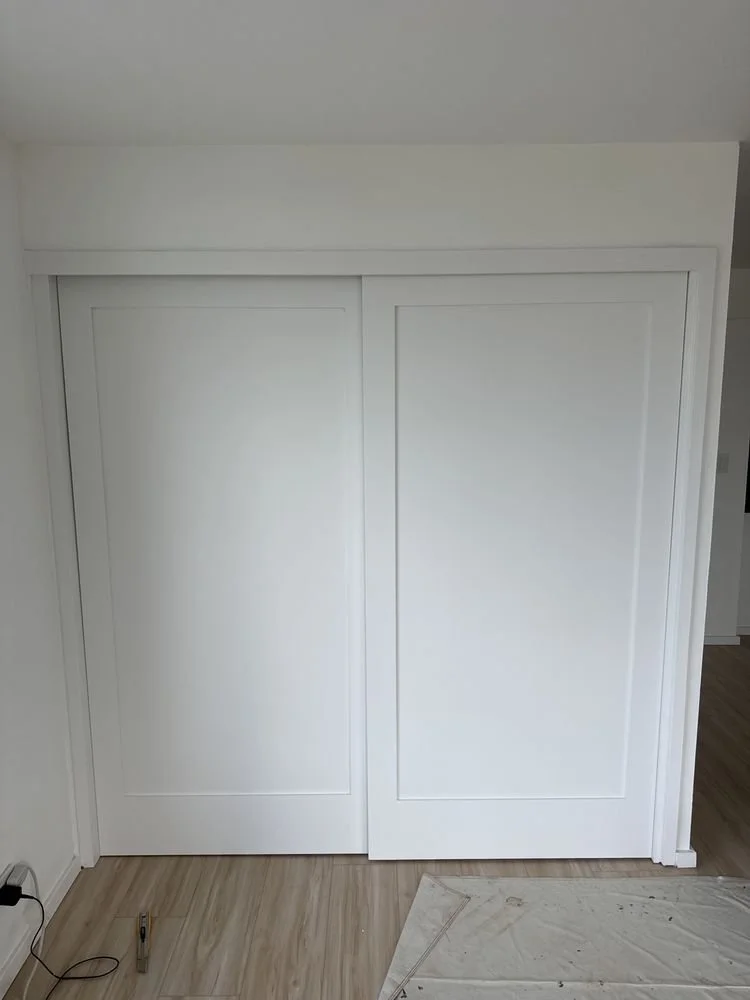 Installed shaker biomass closet doors
