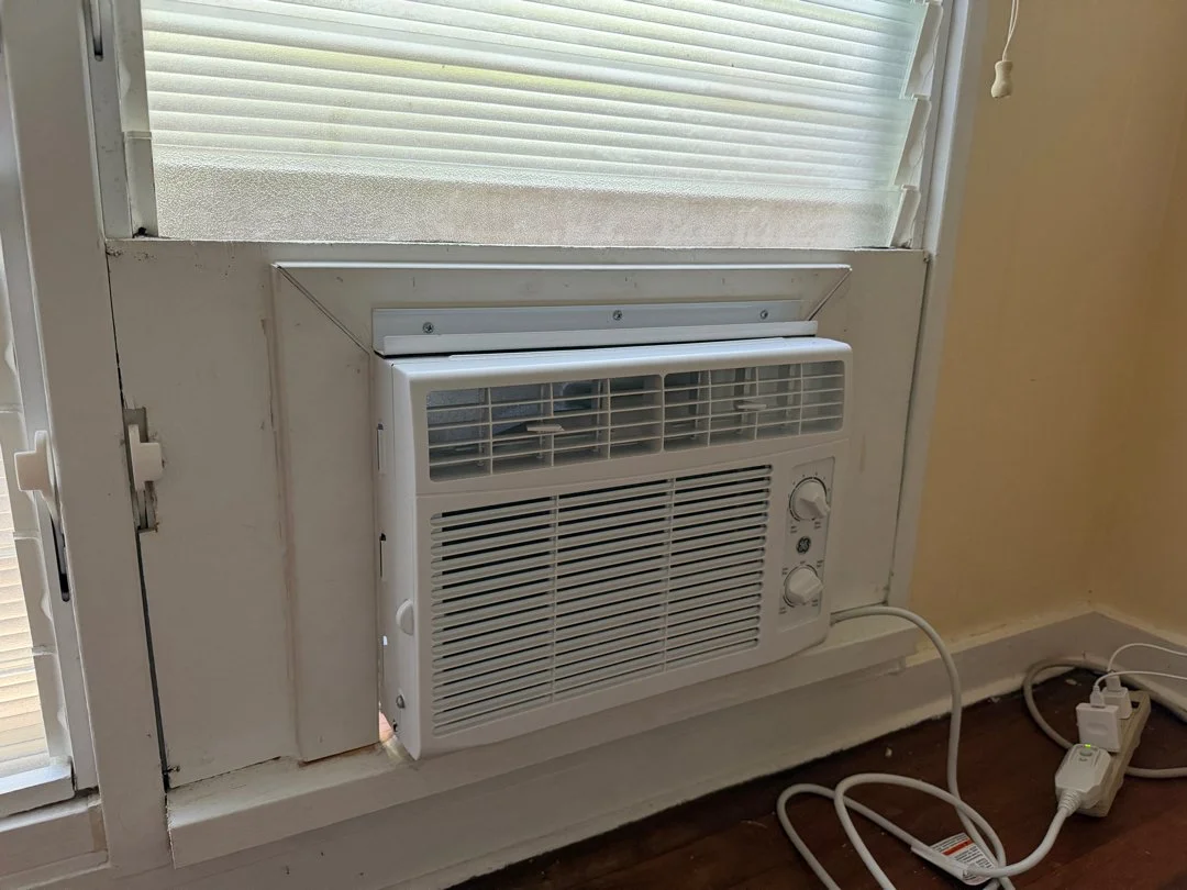 AC with custom plywood installation