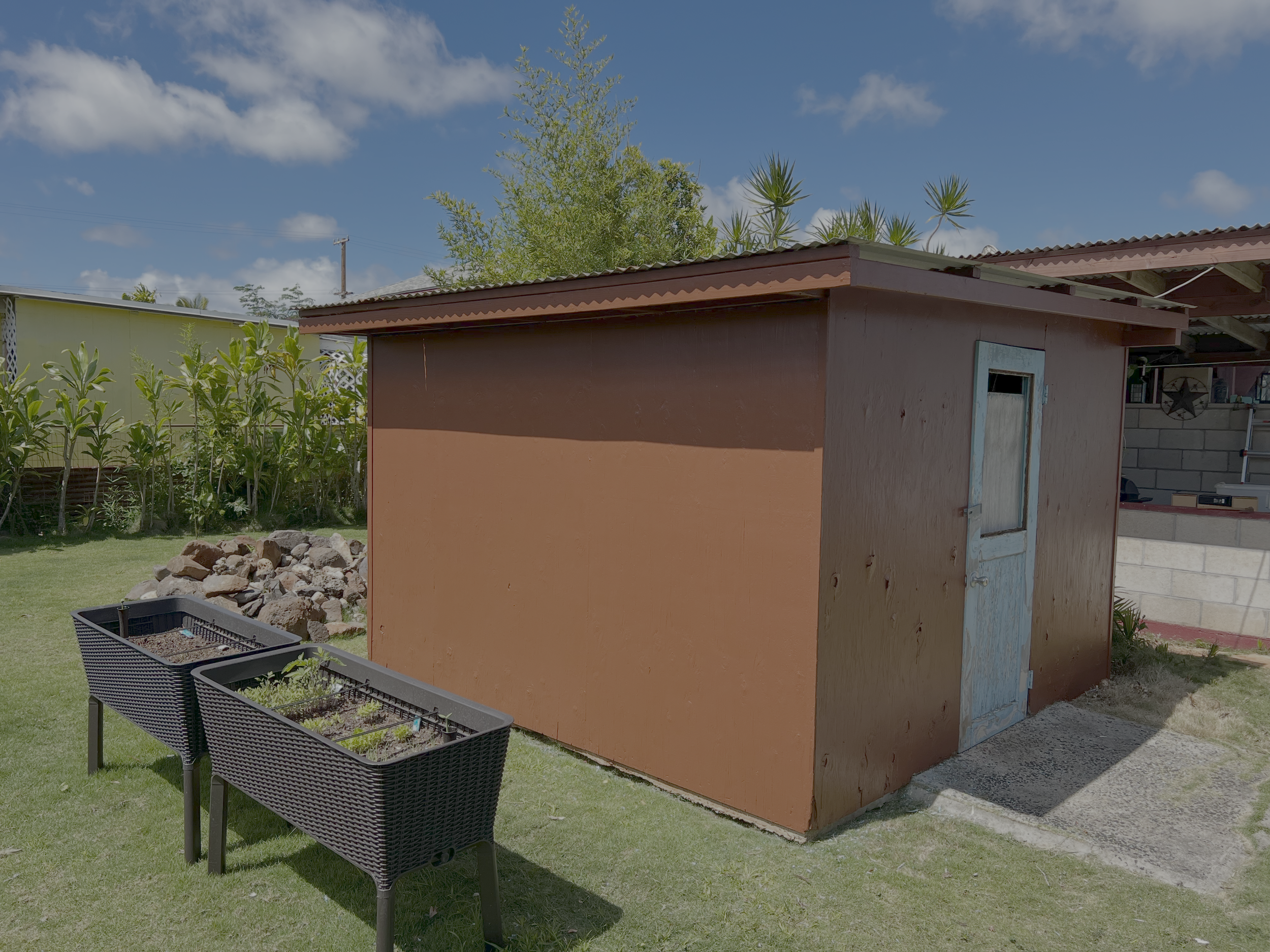 Refinished and painted this outdoor shed
