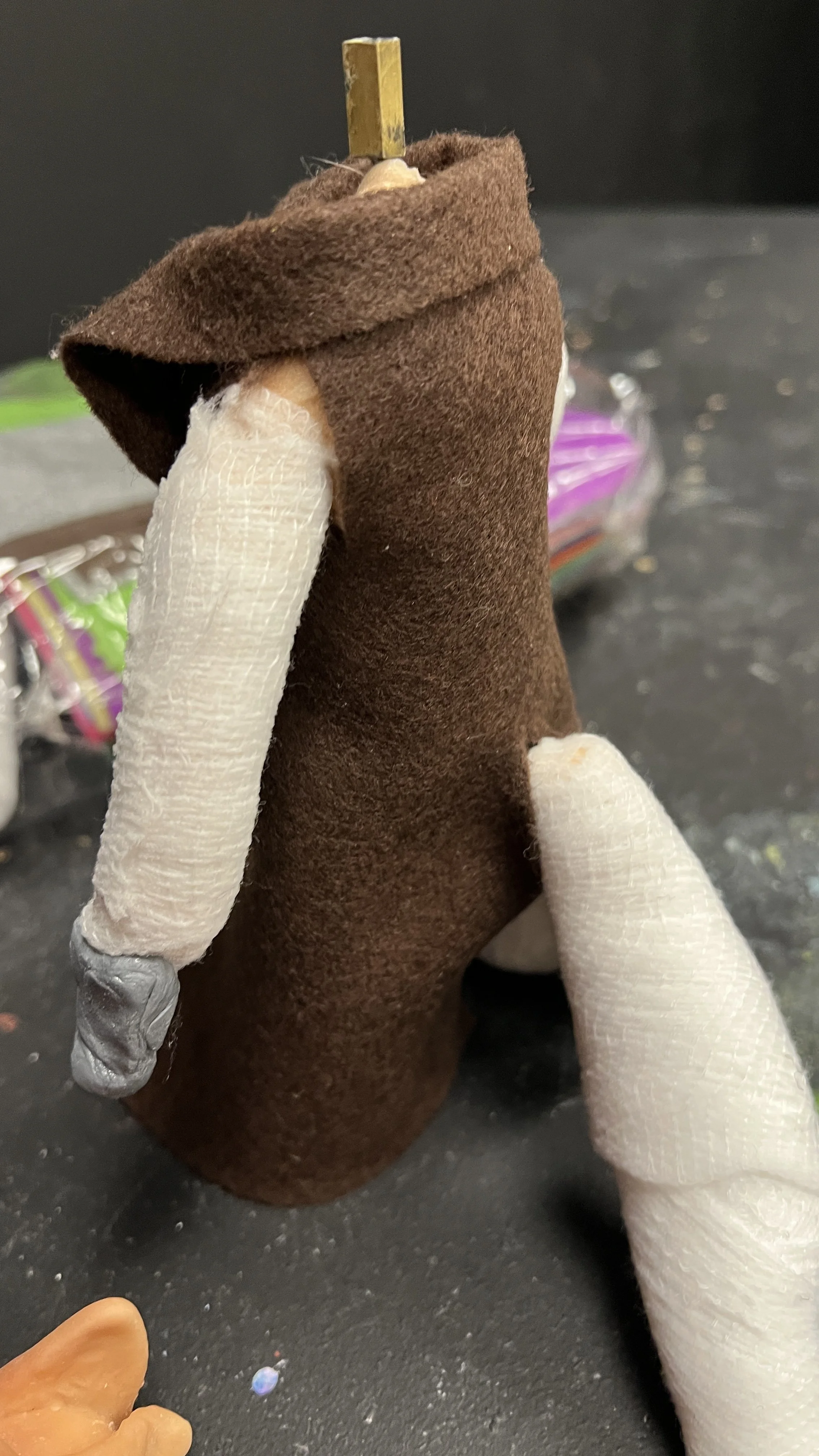 Saved spots on the robe for arms and tail