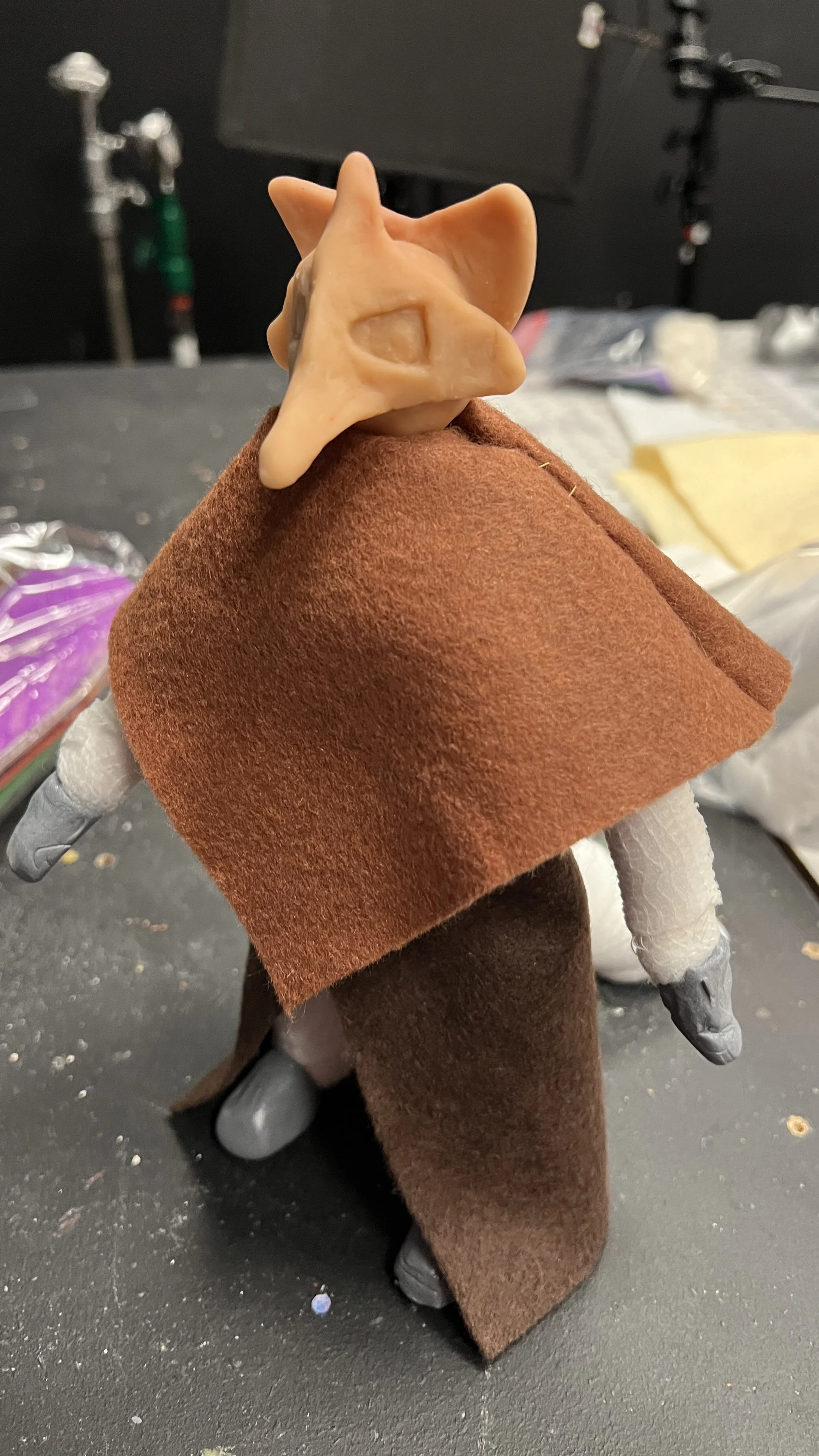 Puppet in working progress, with clothing on