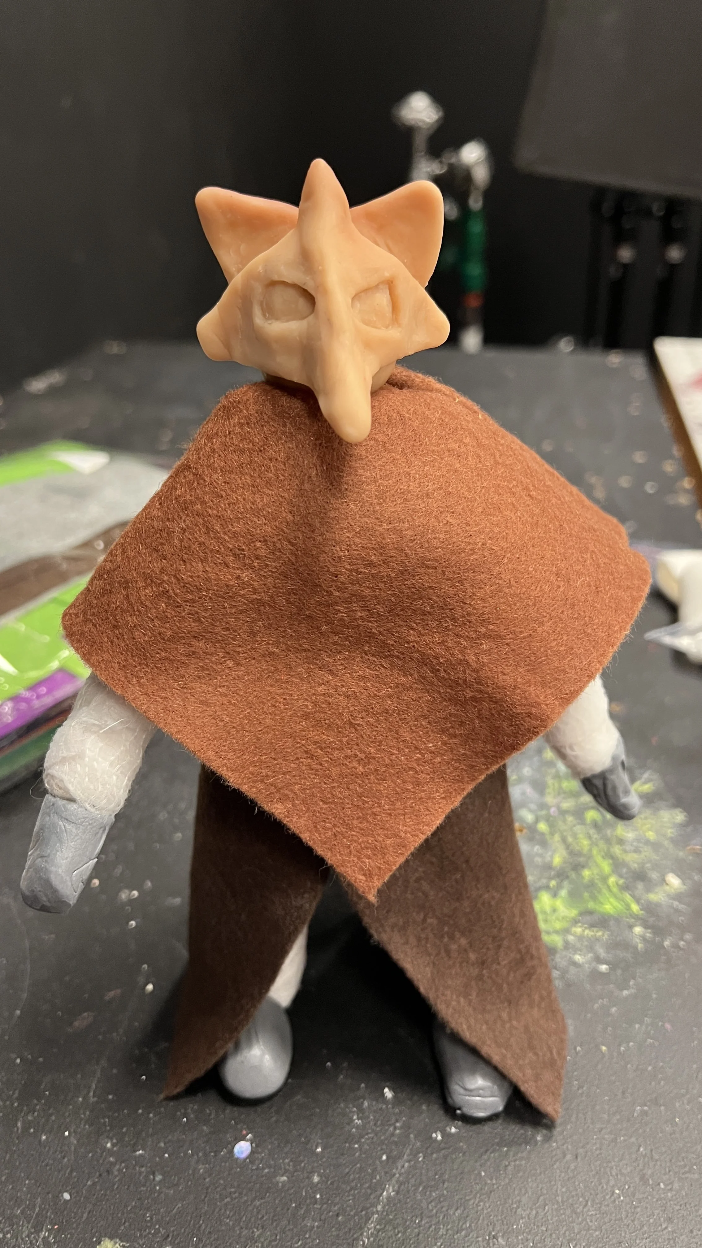Puppet in working progress, with clothing on