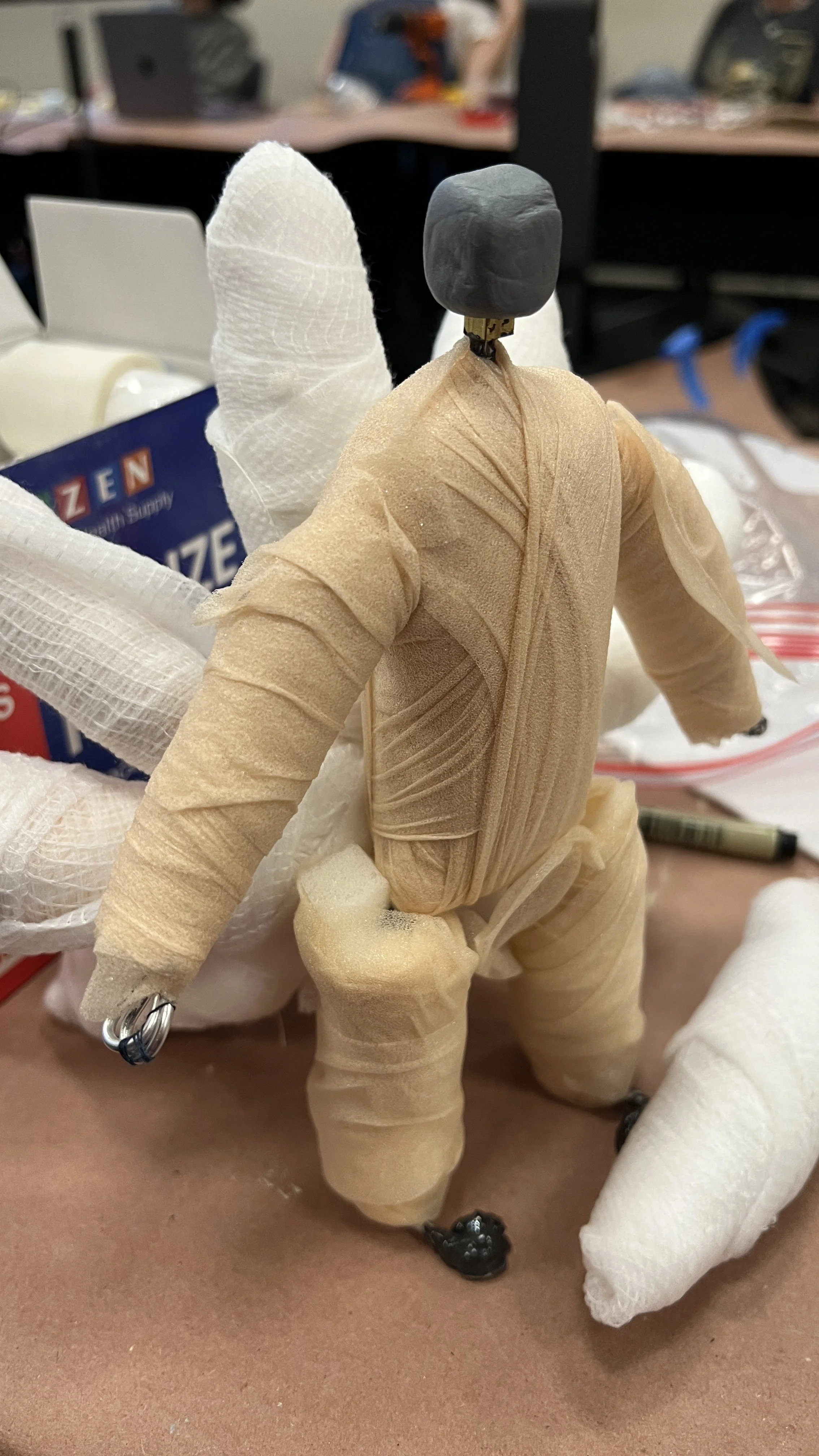 The rough body of the figure