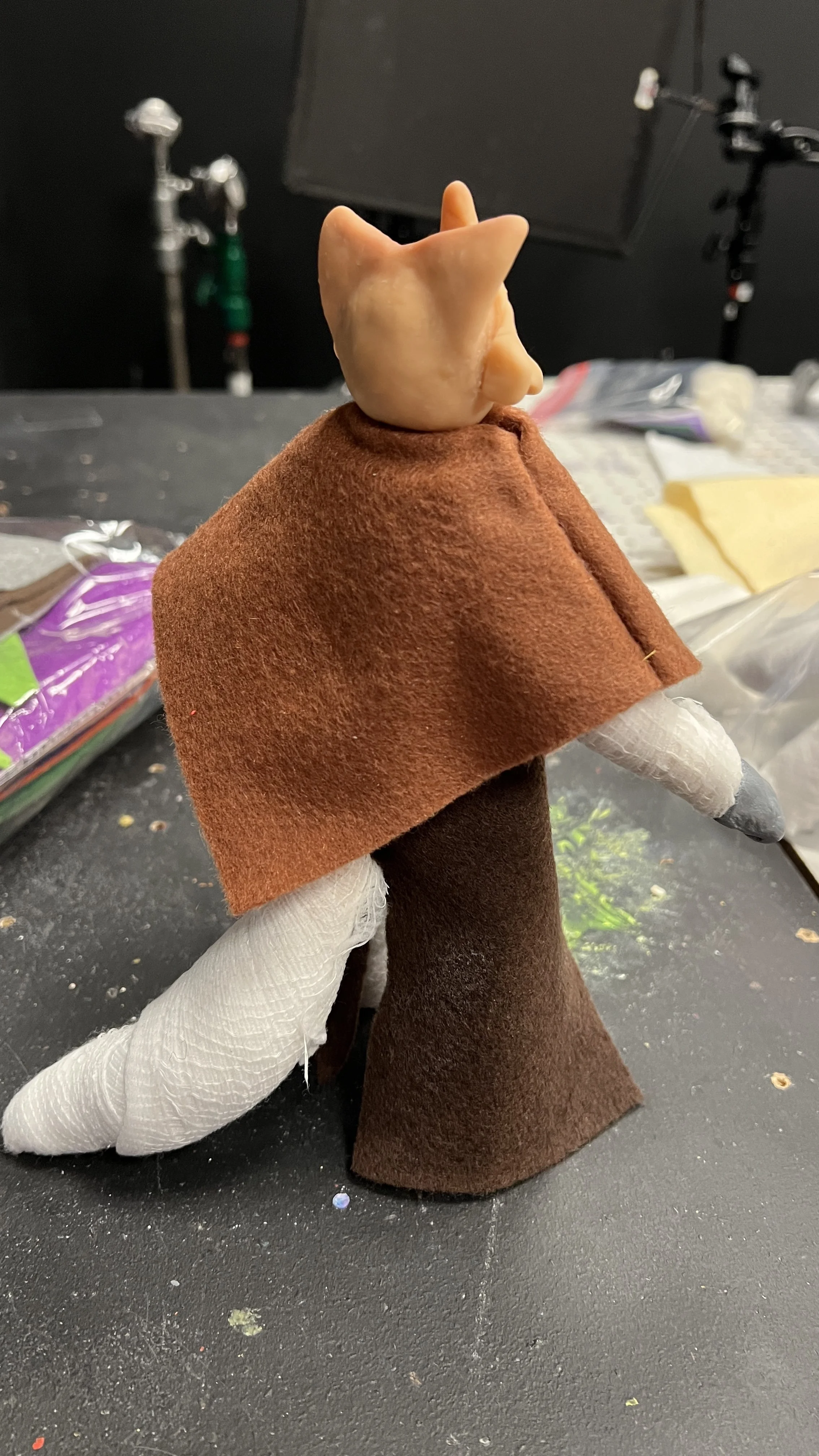 Puppet in working progress, with clothing on