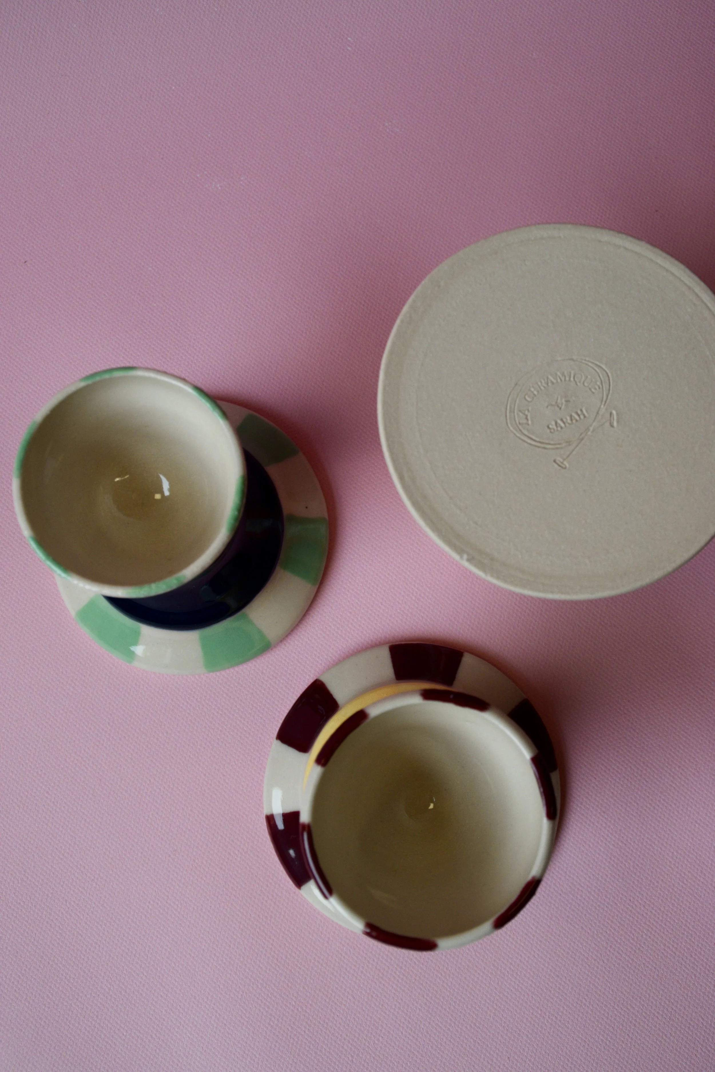 Handmade ceramic egg cups showing base details