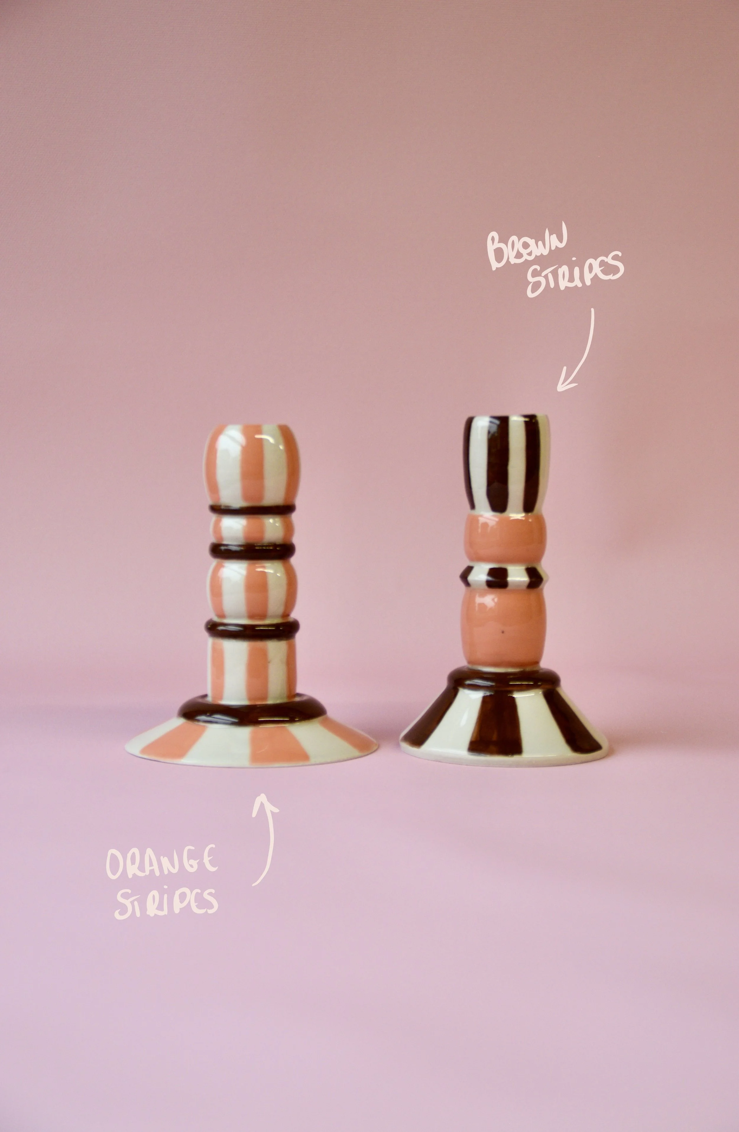 Orange and brown striped ceramic candlestick holders
