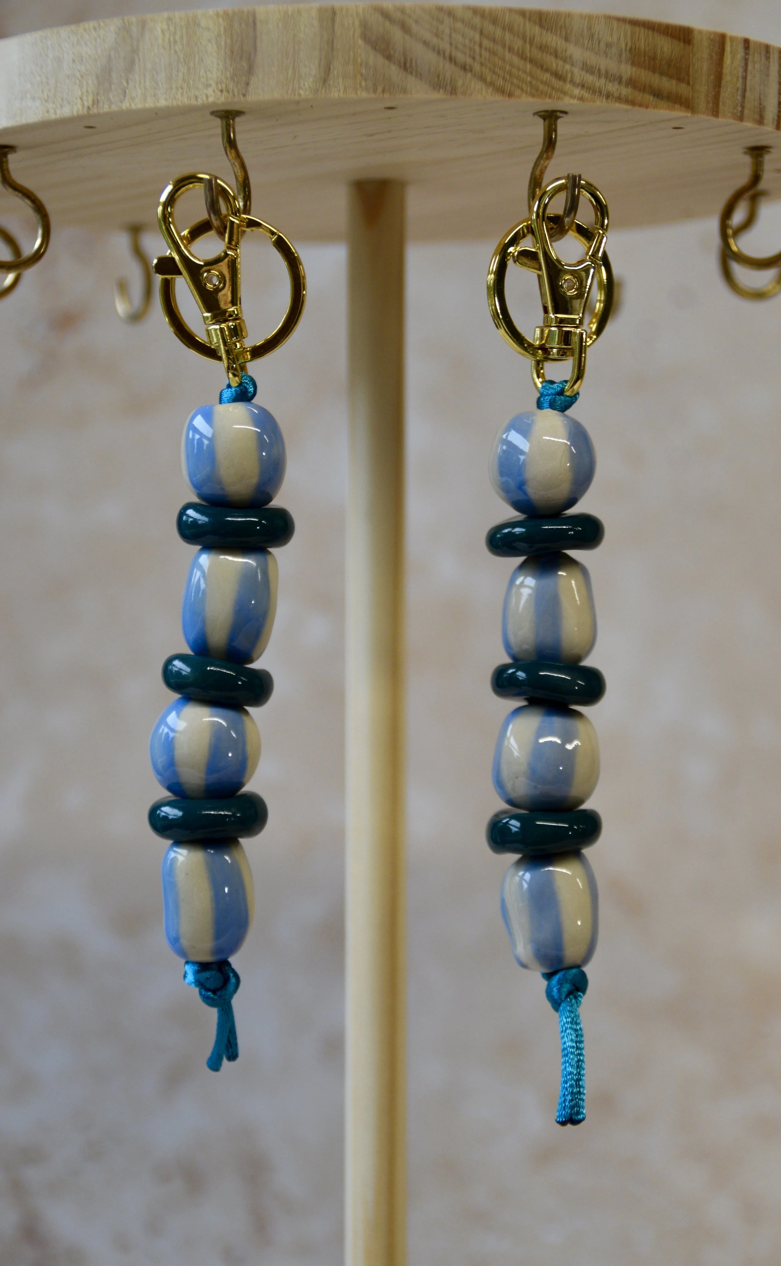 Blue and teal ceramic bead bag charms