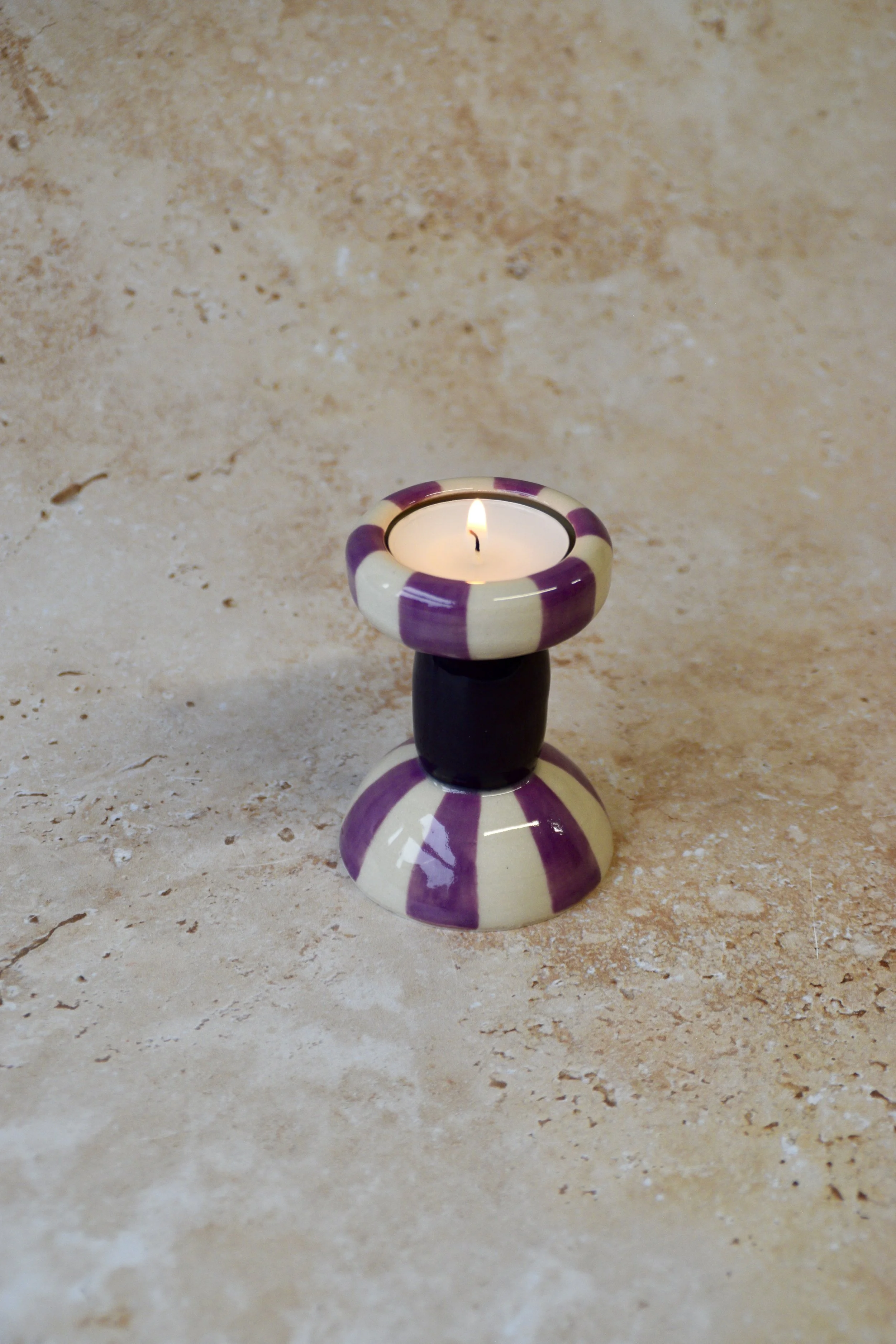 Purple striped ceramic tea light holder