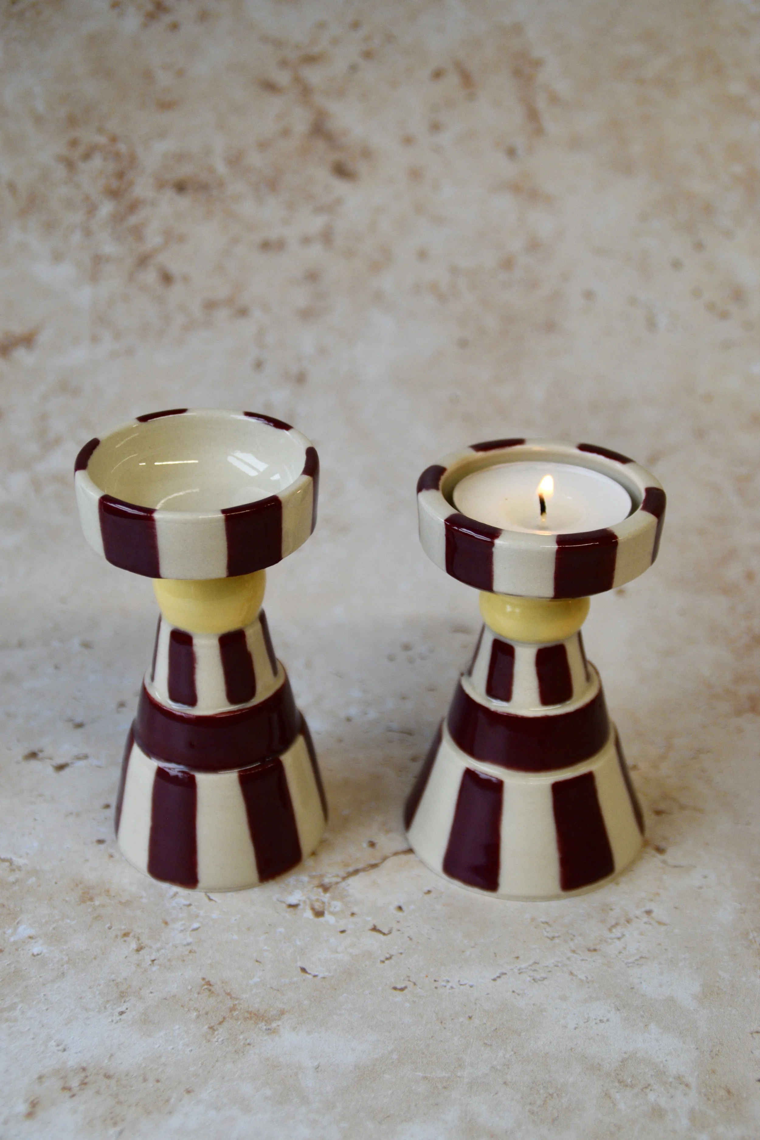 Burgundy and yellow striped ceramic tea light holders