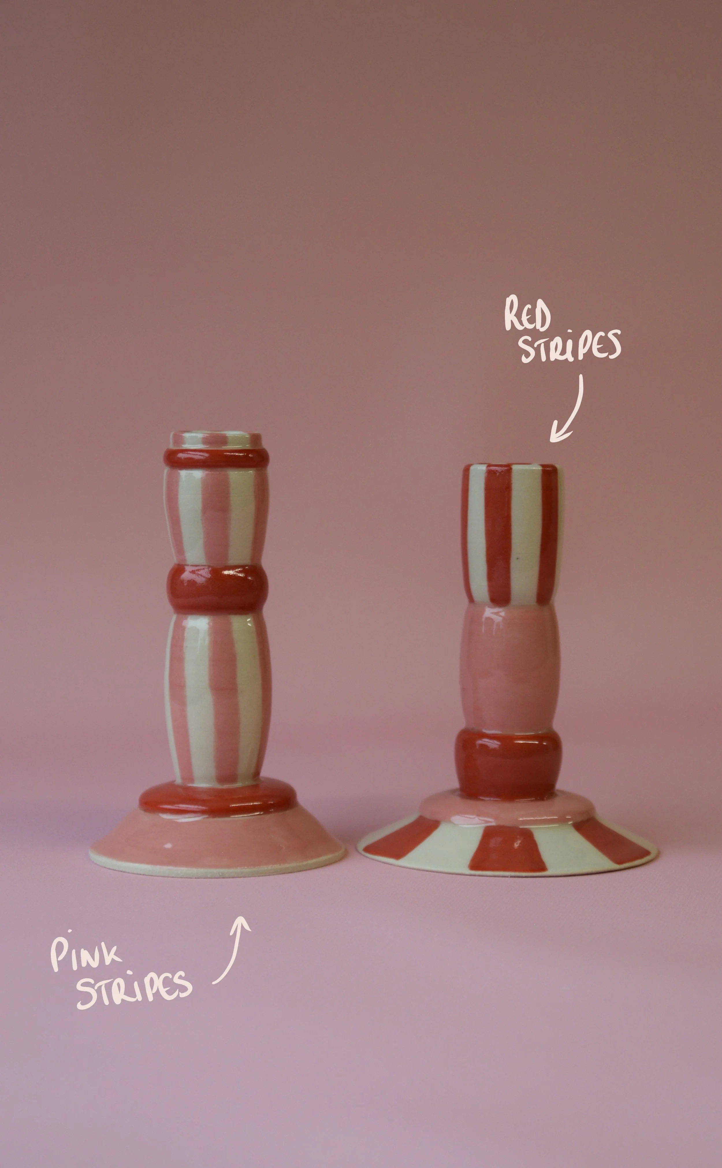 Pink and red striped ceramic candlestick holders