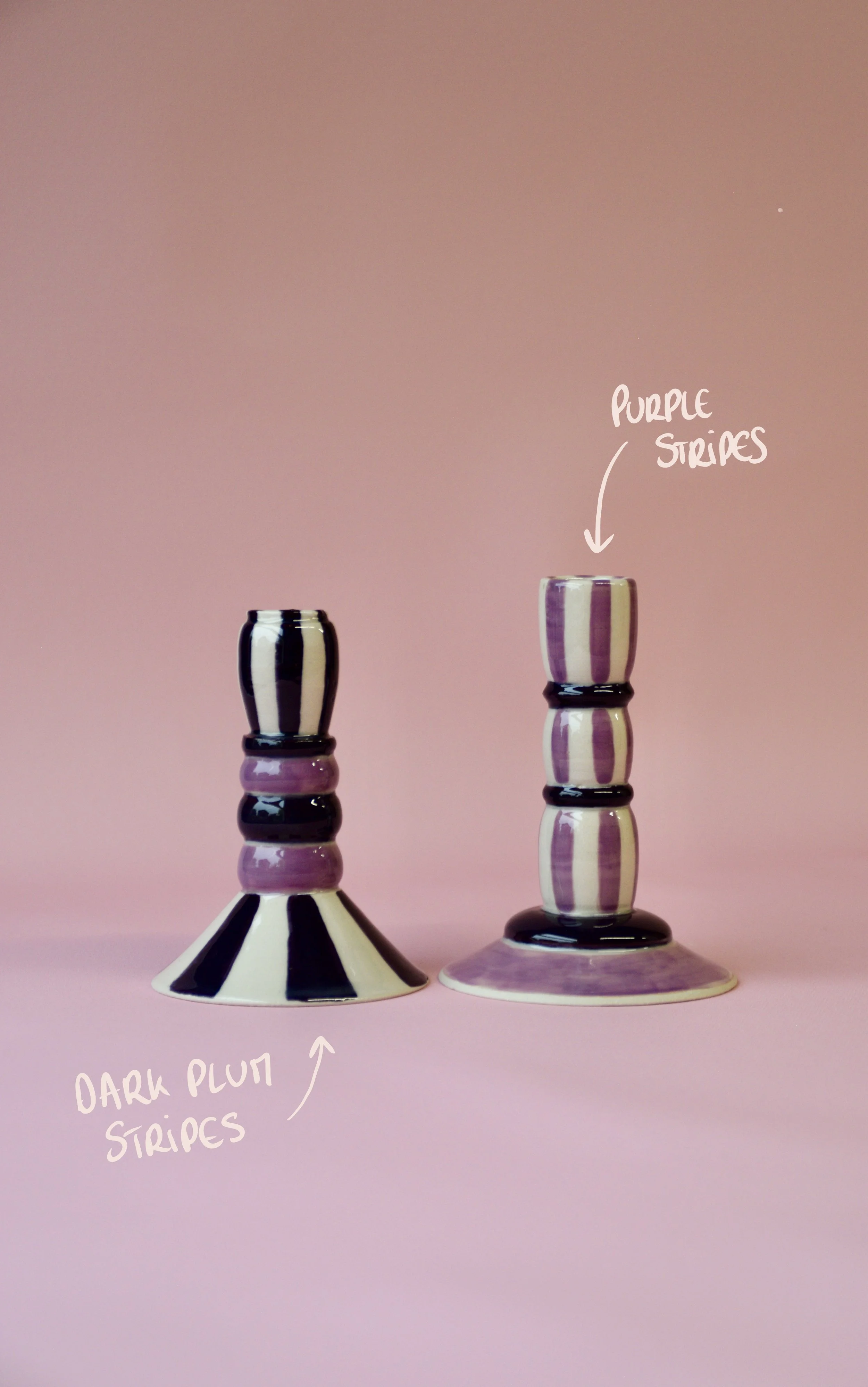 Purple striped ceramic candlestick holders