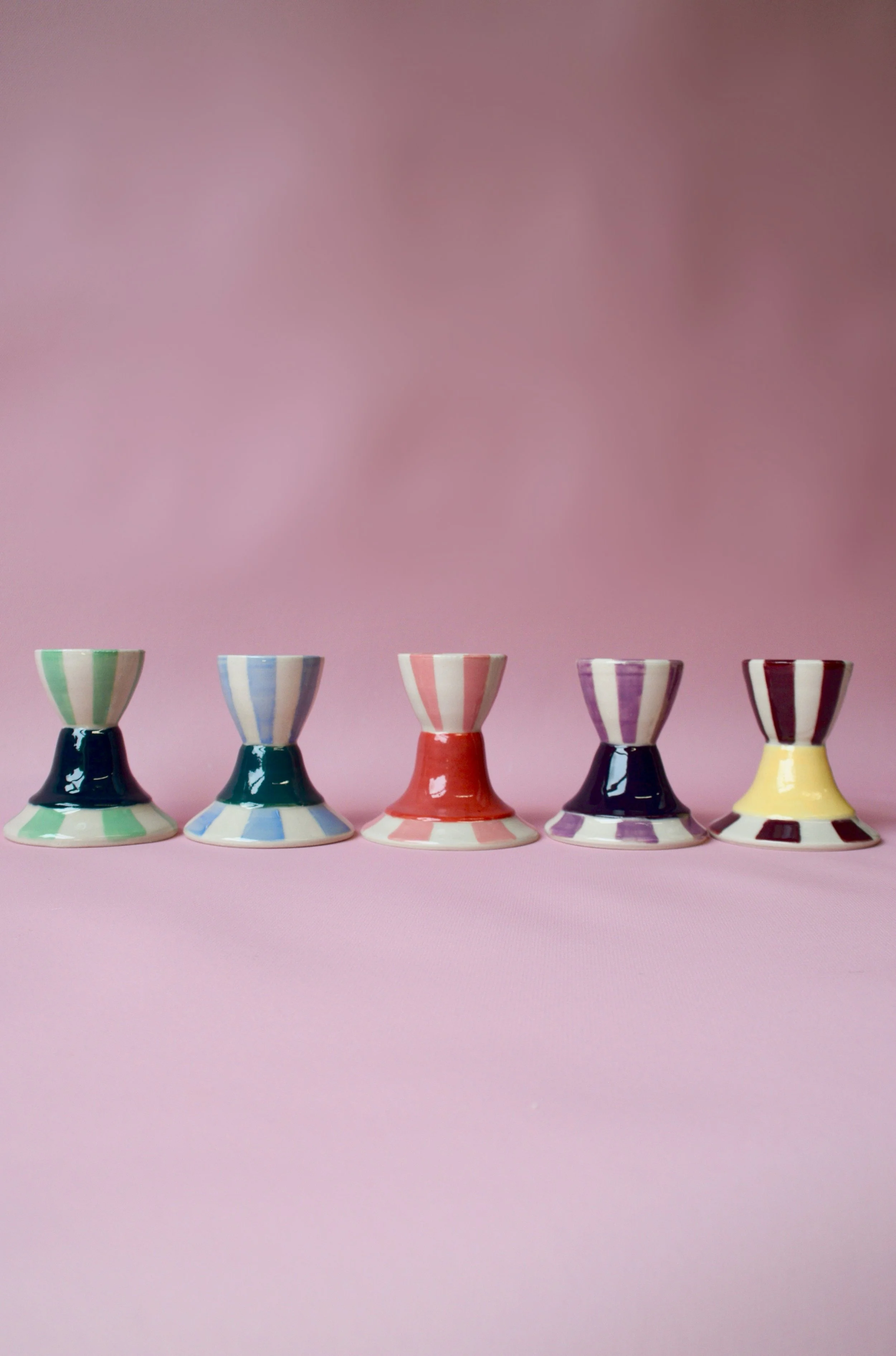 Handmade striped ceramic egg cups in different colourways