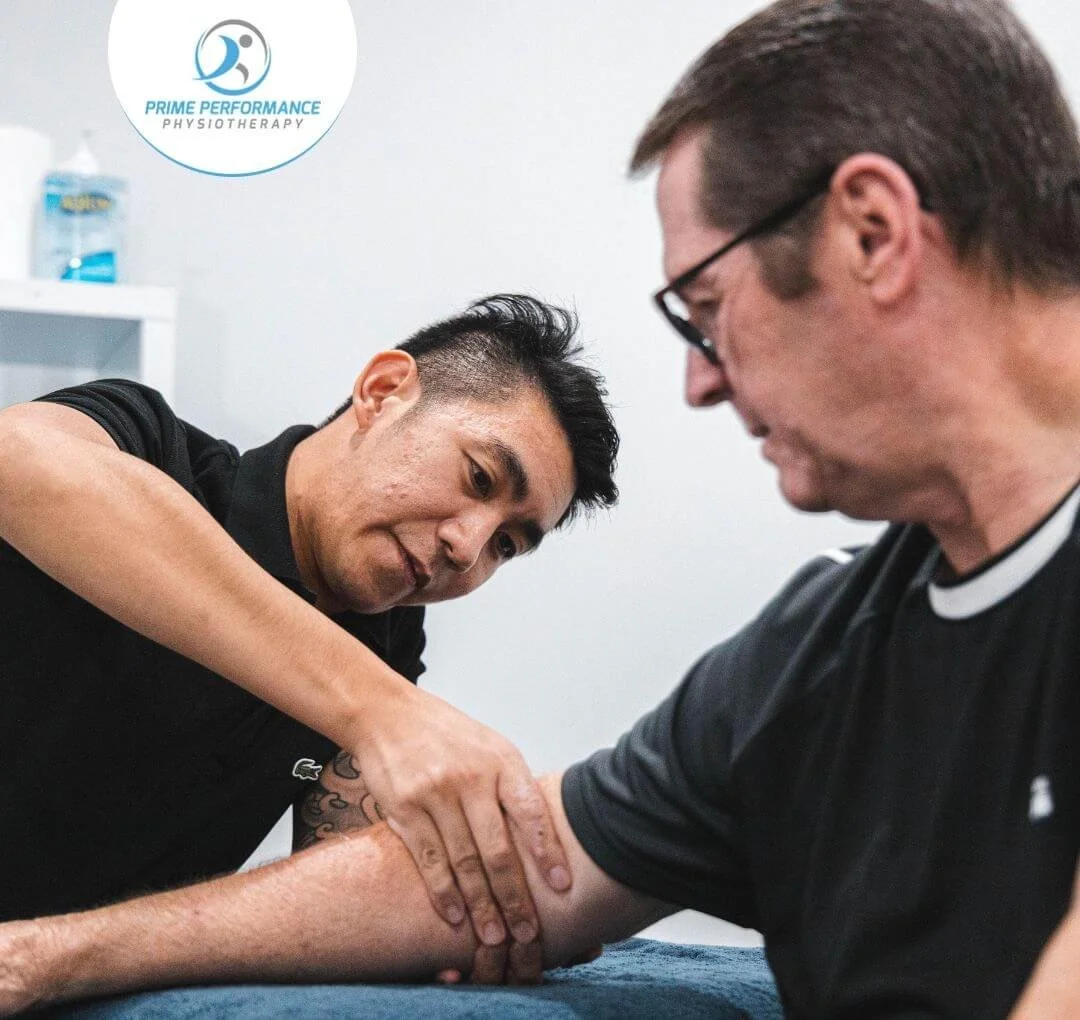 Person receiving a back massage from a massage therapist in a spa or clinic setting.