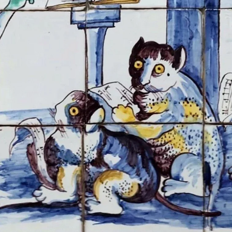 Two anthropomorphic cats with exaggerated human-like features reading a book together inside a room, painted in a colorful, cartoonish style.