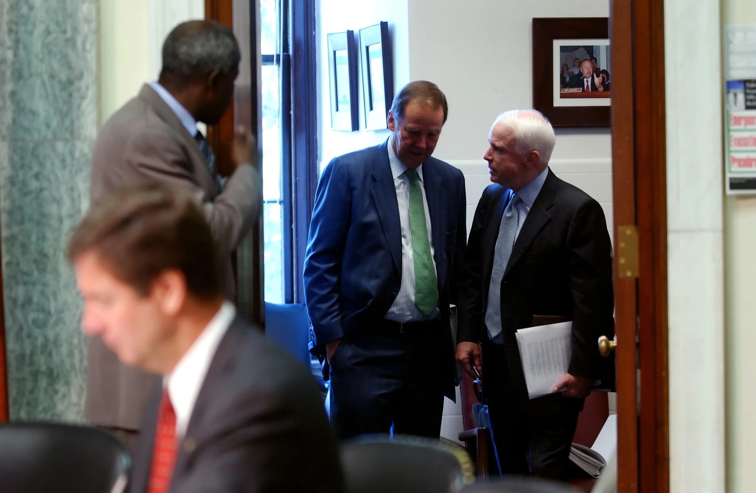 Senator John McCain and Thomas Kean talk before the start of a 9/11 commission hearing in Congress.