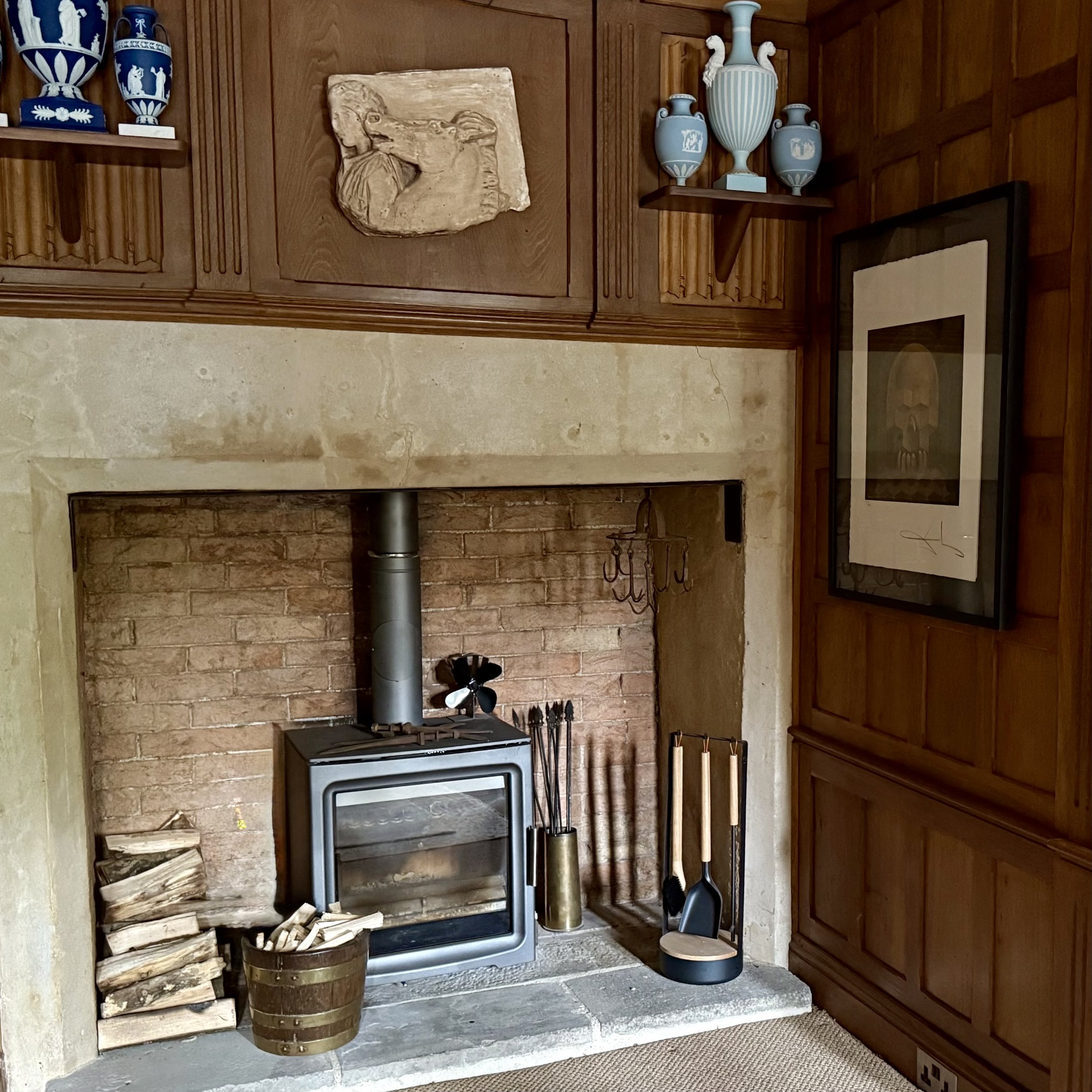 Wood burner in fireplace in snug Asterion and Co.jpeg