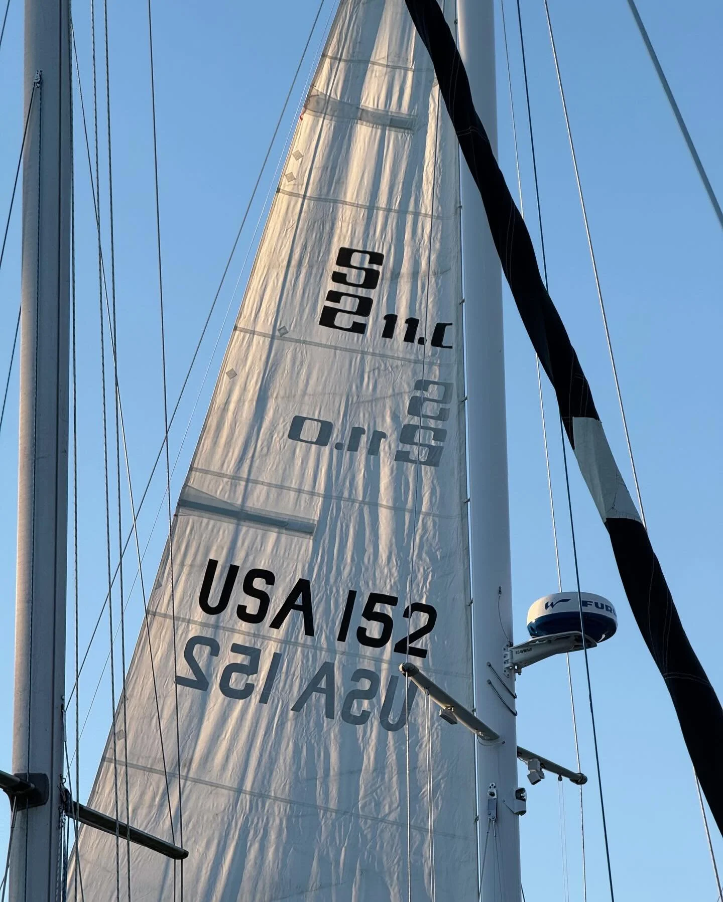 This week we checked off several projects critical to our ability to get underway. While it was still warm out, we dug the sails out of storage. We were able to easily put the main up ourselves. However, we enlisted the help of our very kind boat nei