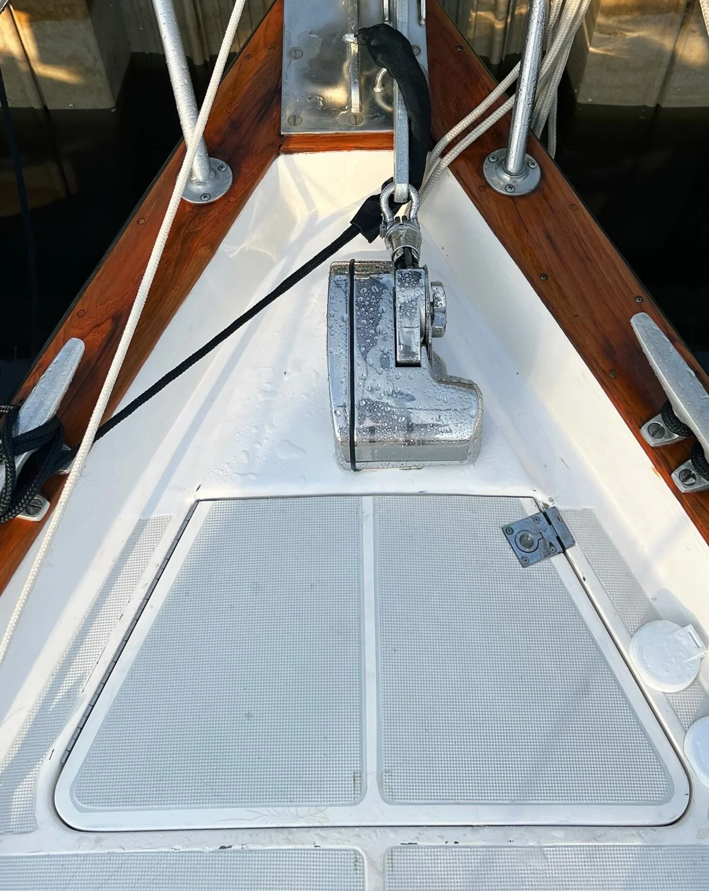 Ta-dah! The windlass is installed and operational! Evan spent the week building supports and getting the windlass mounted. Over the weekend, we worked together to wire and connect the windlass along with the foot controls on deck. We then fed the lin