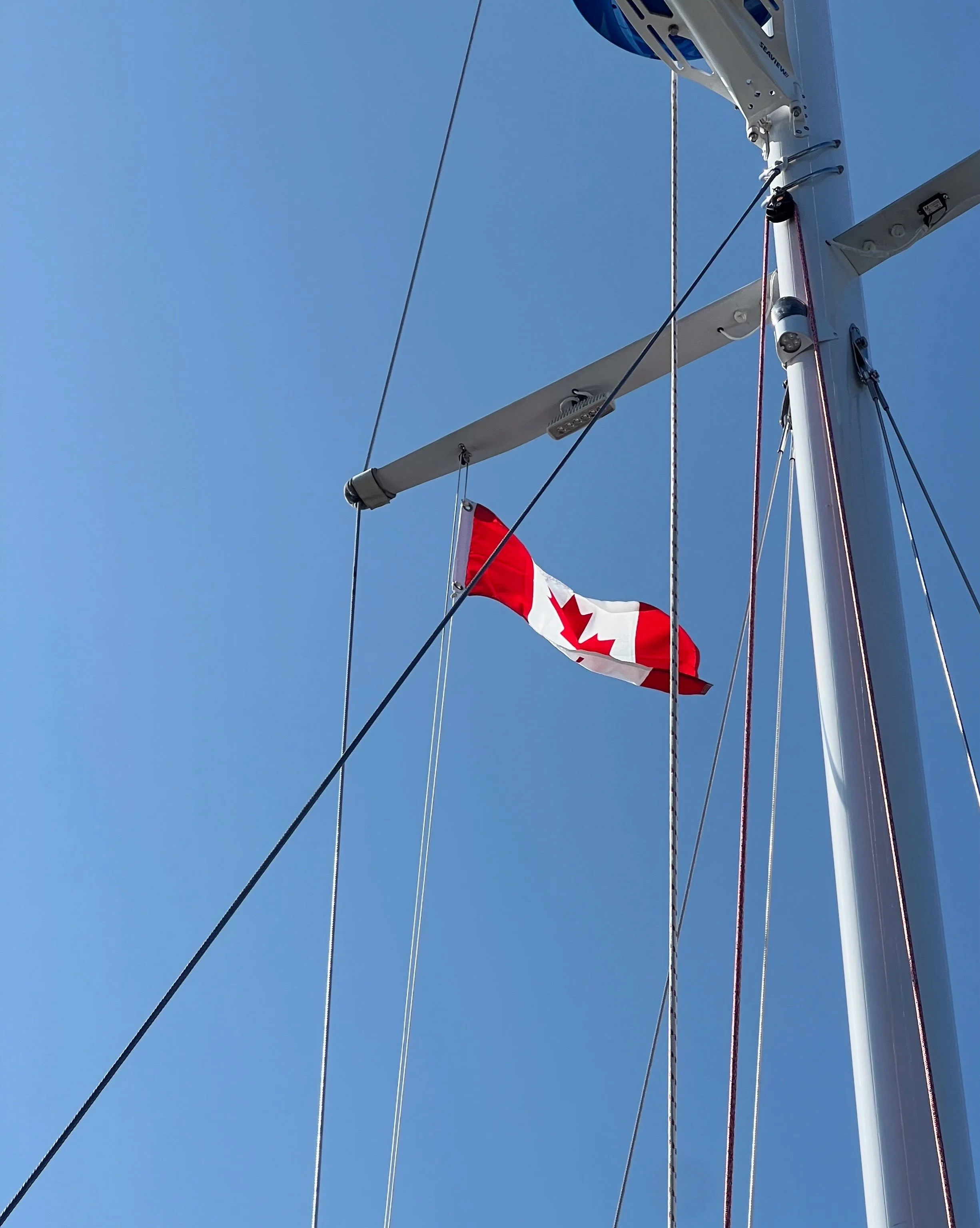 Day 63 &bull; Oh, Canada! We have arrived after 27 hours. As far as the trip north goes, this passage was our best but still challenging. We were nearly becalmed much of the night, slugging forward at an average of 2 knots as we entered thick fog. Th