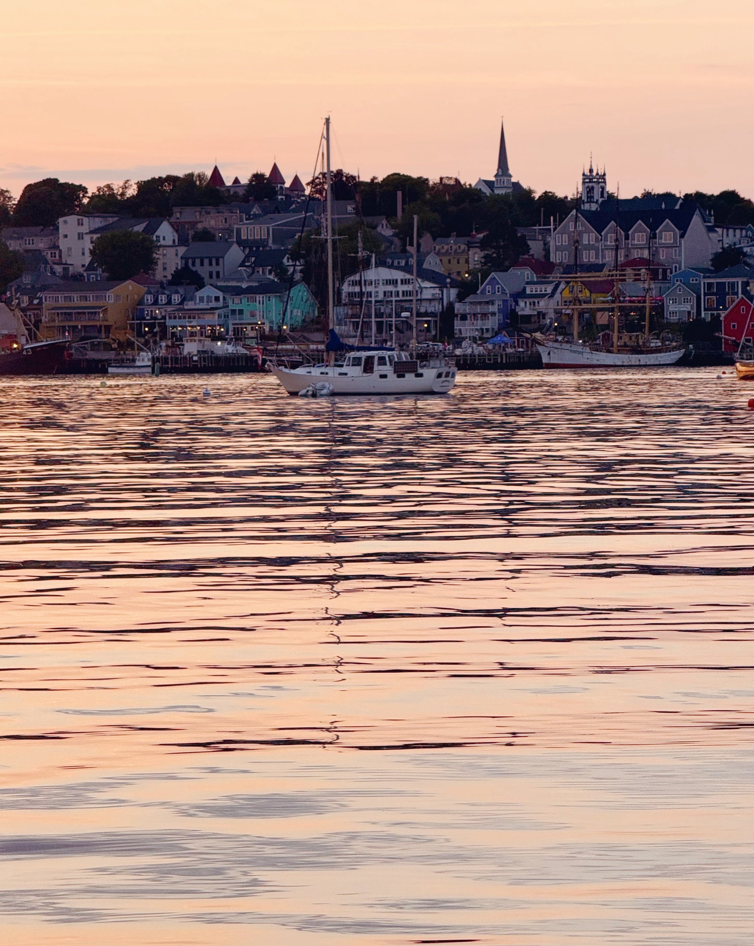 Day 76 &bull; We were busy, busy getting ready for guests today. Meriah spent the morning in the cramped laundry room while Evan handled water and provisions. Space was cleared, beds were made. Then we were off to shore to retrieve our tired traveler