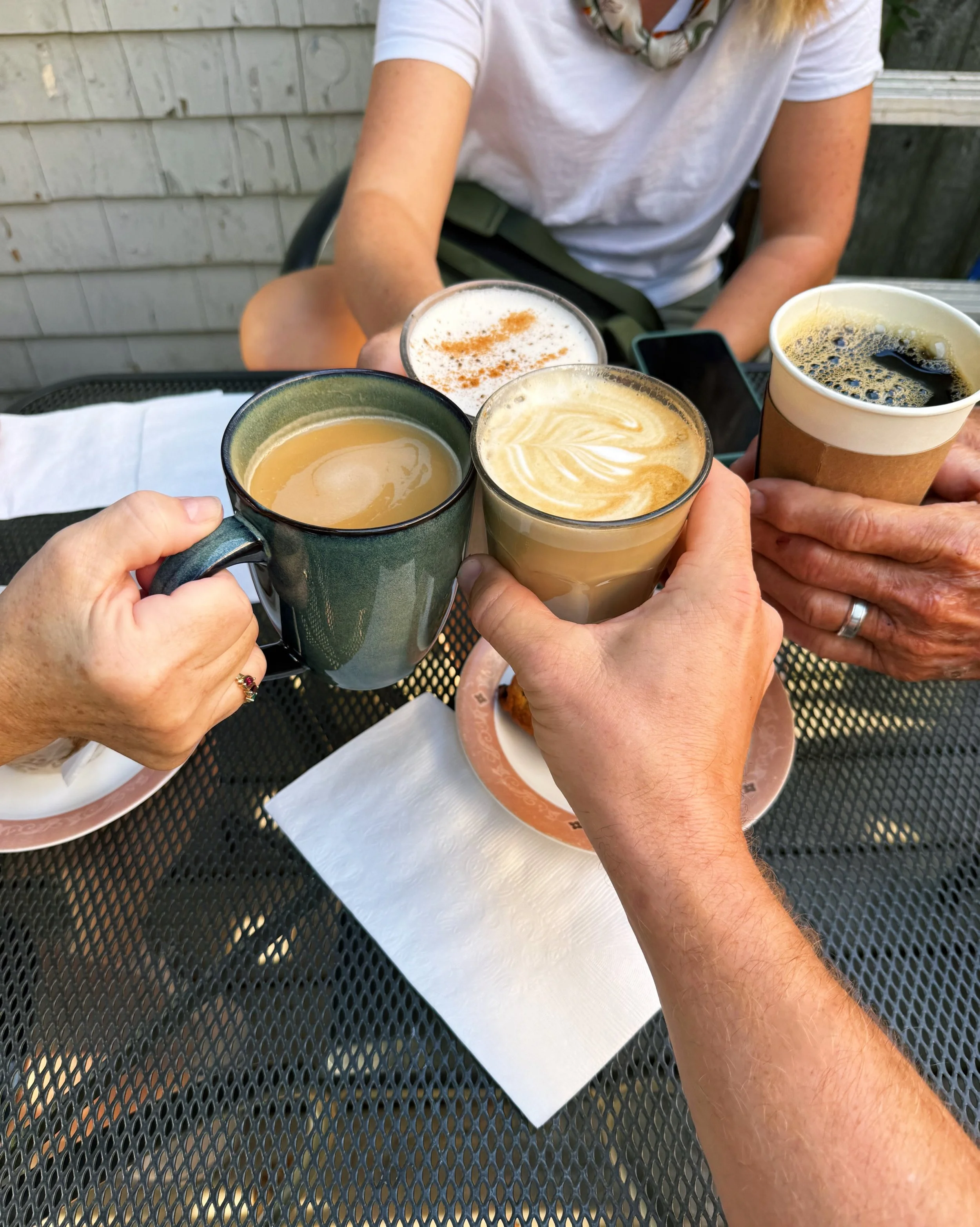 Day 77 &bull; We enjoyed coffees and pastries on the patio before walking nearly all of colorful Lunenberg. We checked out the shops, the inside of an old church and lots of old buildings. We admired the horses, caught bits of the Folk Music Festival