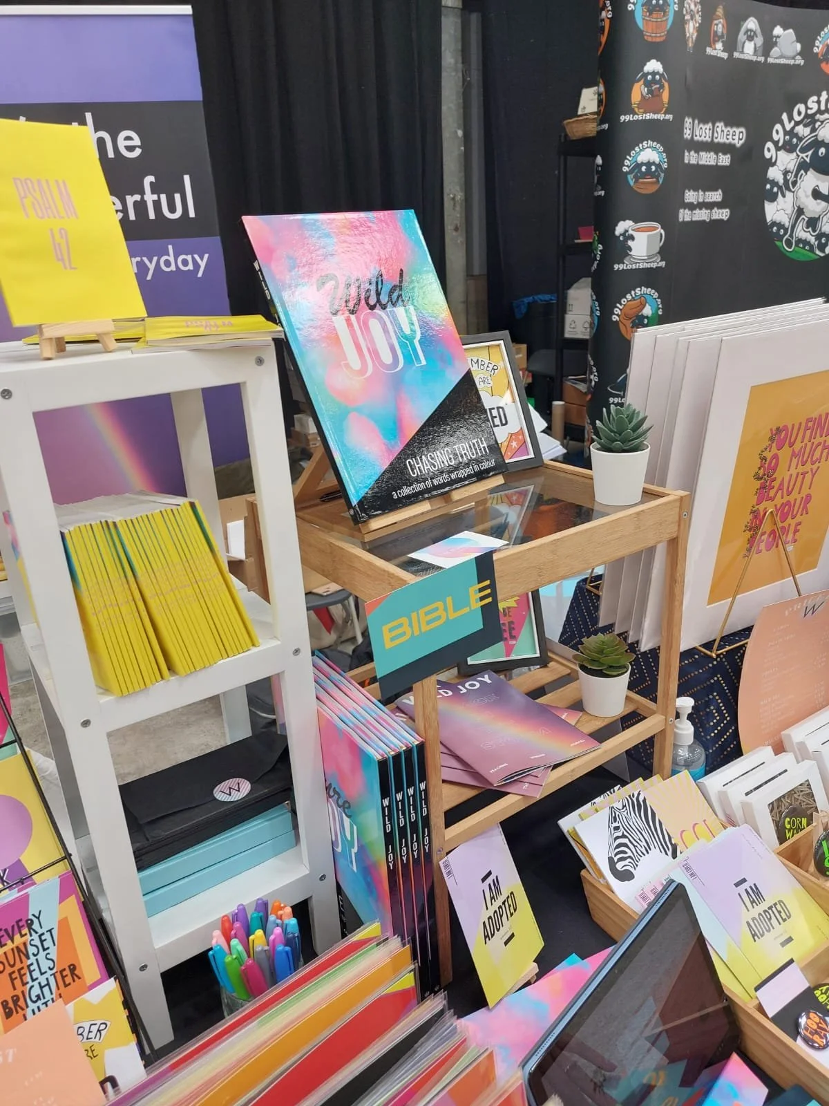 A peek at our colourful market setup — filled with joyful prints, playful products, and design work that brings heart to every table.