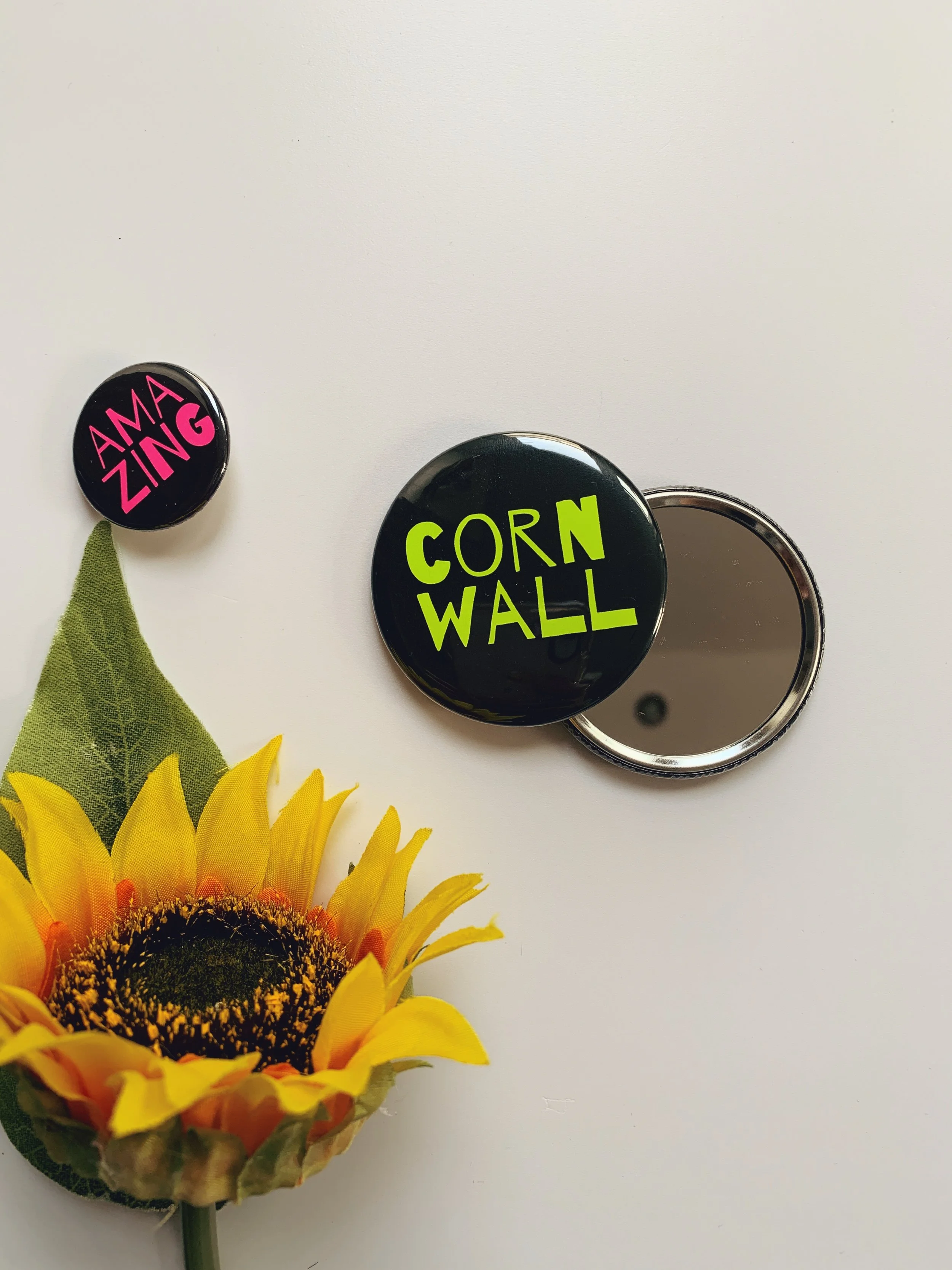 Pocket Mirror with Illustrated Design & Button Badges – Small and strong messaging pieces for youth groups, events, and community packs.