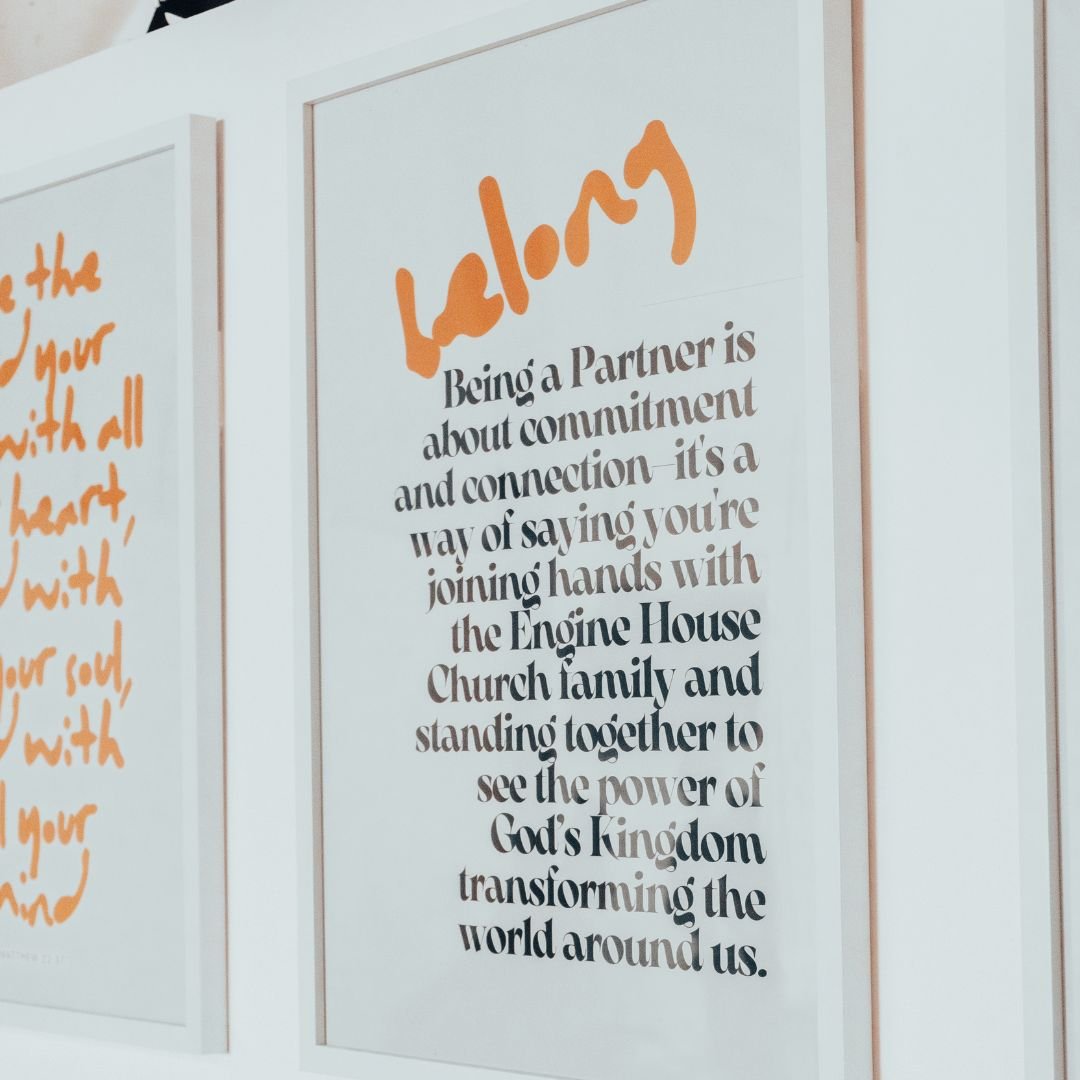 Poster with the word "Loving" in orange script at the top, followed by a paragraph about partnership and community, emphasizing commitment, connection, and transforming the world through faith.