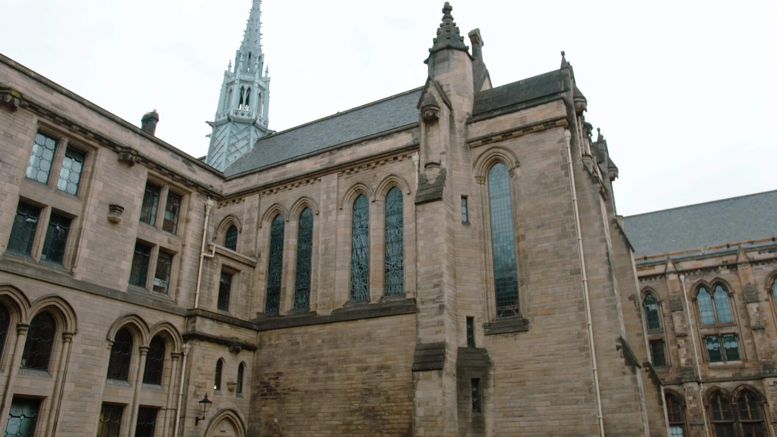 The Memorial Chapel at the University of Glasgow, showcasing its Gothic Revival architecture and historic stonework