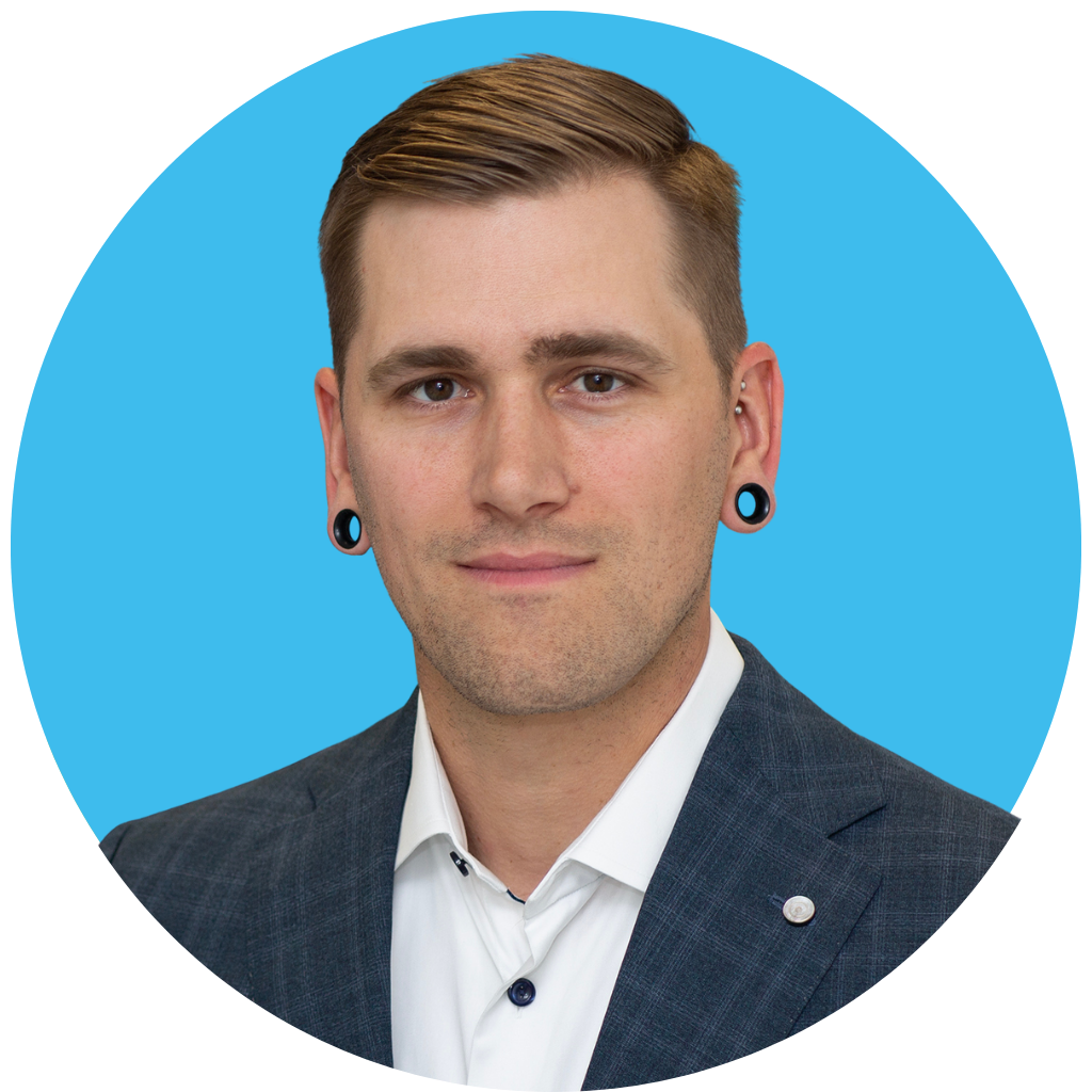 Portrait of Prof. Nicholas Banovich, Vice President of Scientific Development at TGen, leading research in single-cell and spatial genomics to study genetic variation and complex human disease.