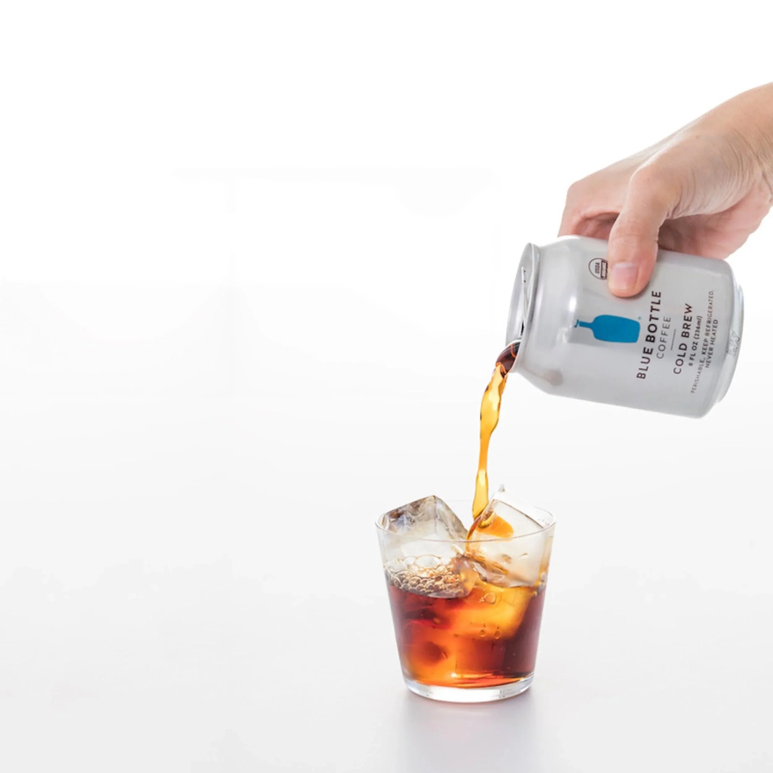 Pack copy for the brand's first CPG product. The back of the can reads: Don’t let its diminutive size fool you. Cold Brew is pure power, luminous clarity, and electrifying zing.