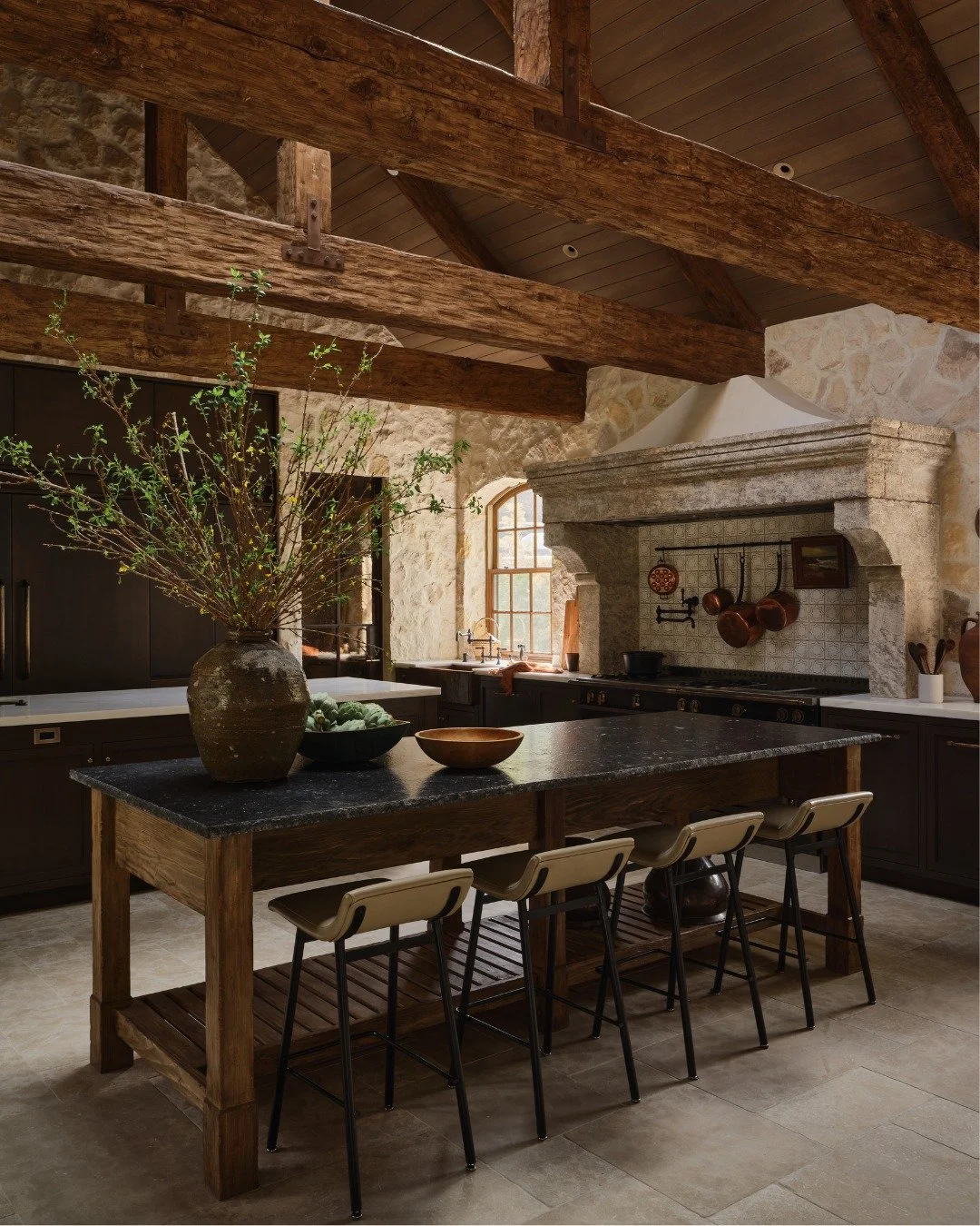 This french country&ndash;inspired kitchen features antique stone surfaces that ground the space in history and authenticity.

Swipe for behind the scenes details of the gorgeous antique stone hood!

📸 @michaelcliffordphotography
Construction: @buil