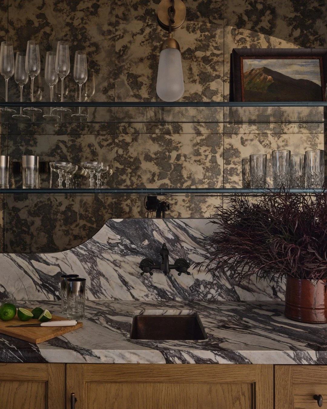 Textures, Layers and Details. Bespoke Interiors is our specialty. 

Swipe to see the details of a custom Wetbar we designed, incorporating floating glass shelves, antique mirror walls, Calacatta Viola marble countertops, antique copper plumbing and c