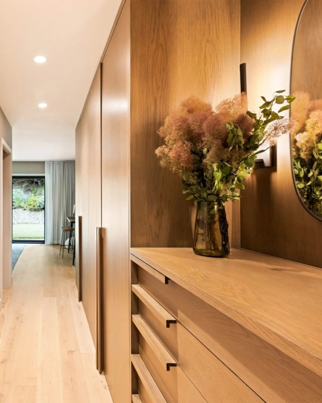 In the entry to the Primary Suite at our Canyon House residence, custom walnut cabinetry now lines the interior corridor and opens into a generous walk-in closet. 

Swipe to design renderings!

#midcentury #bedroomrenovation #moderninterior #interior