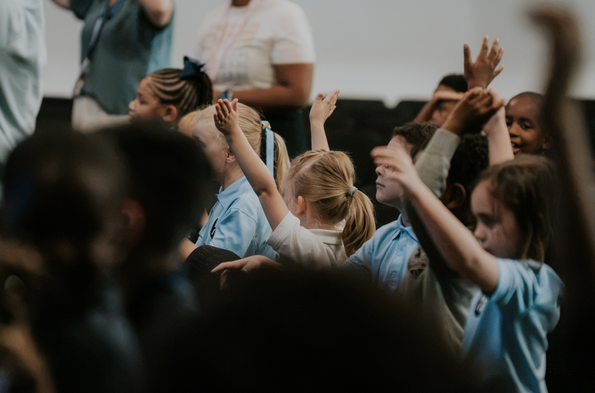 New Life Academy students worshiping in chapel