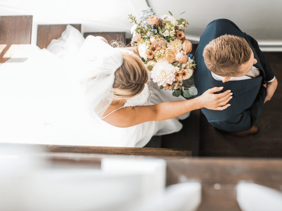 Bride and groom during a Charleston wedding ceremony at a historic home