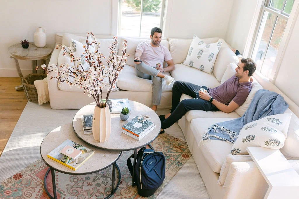 guests relaxing in living room of historic Charleston vacation rental