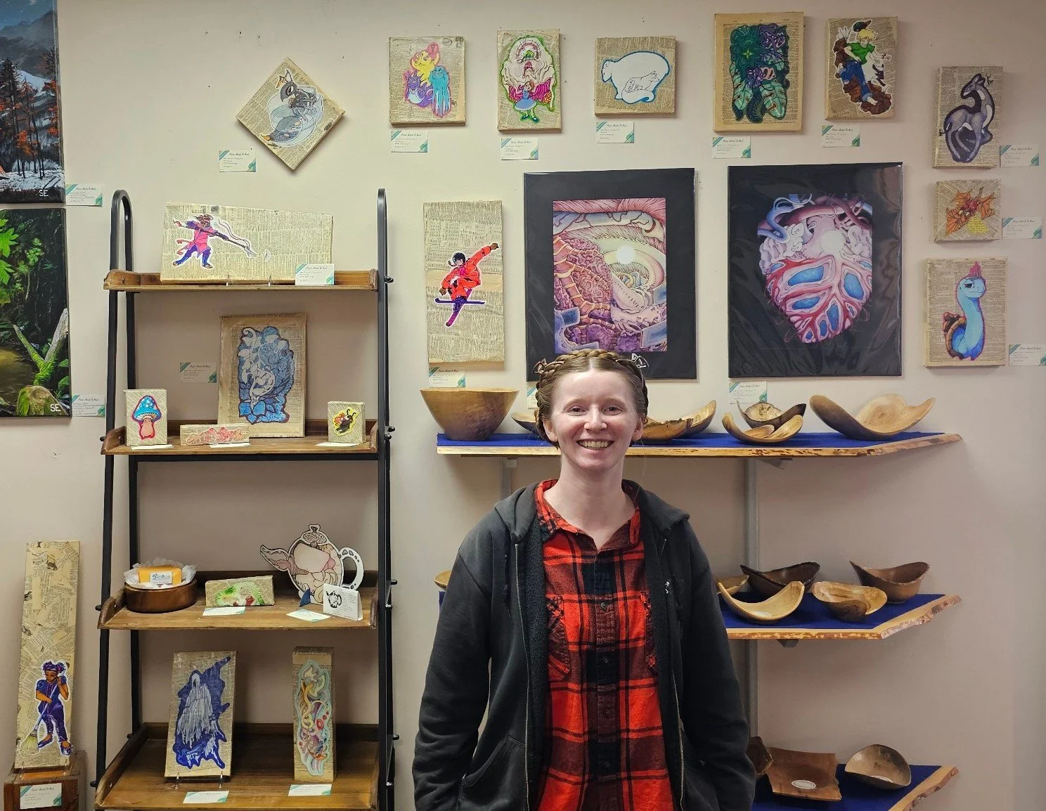 Sierra standing in front of artwork