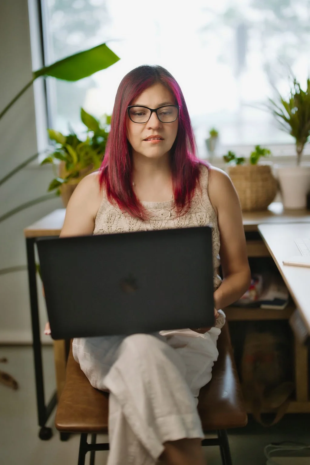 Veronica Diaz, Web Designer, working on client's website