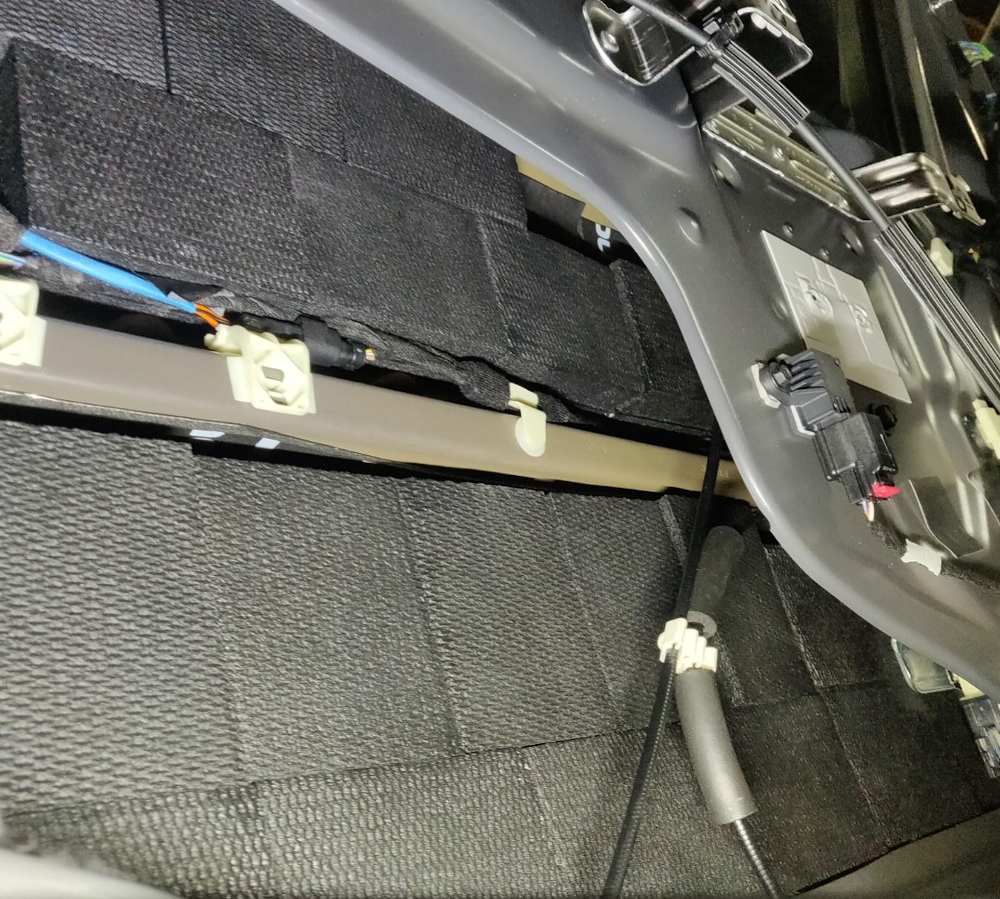 Blackhole Mat applied behind the interior door panel to control panel vibration and eliminate rattles.