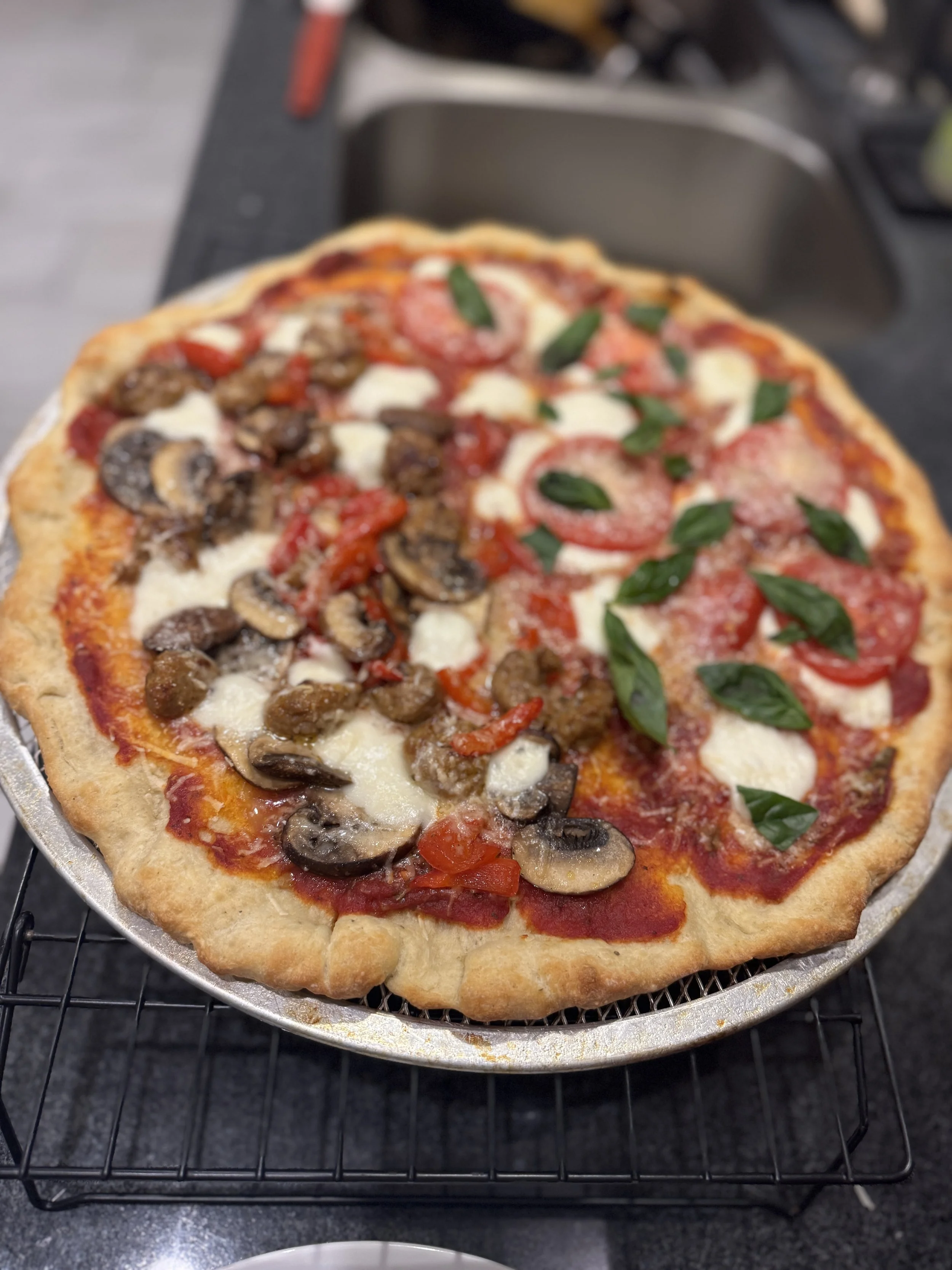 Pizza with handmade crust and toppings