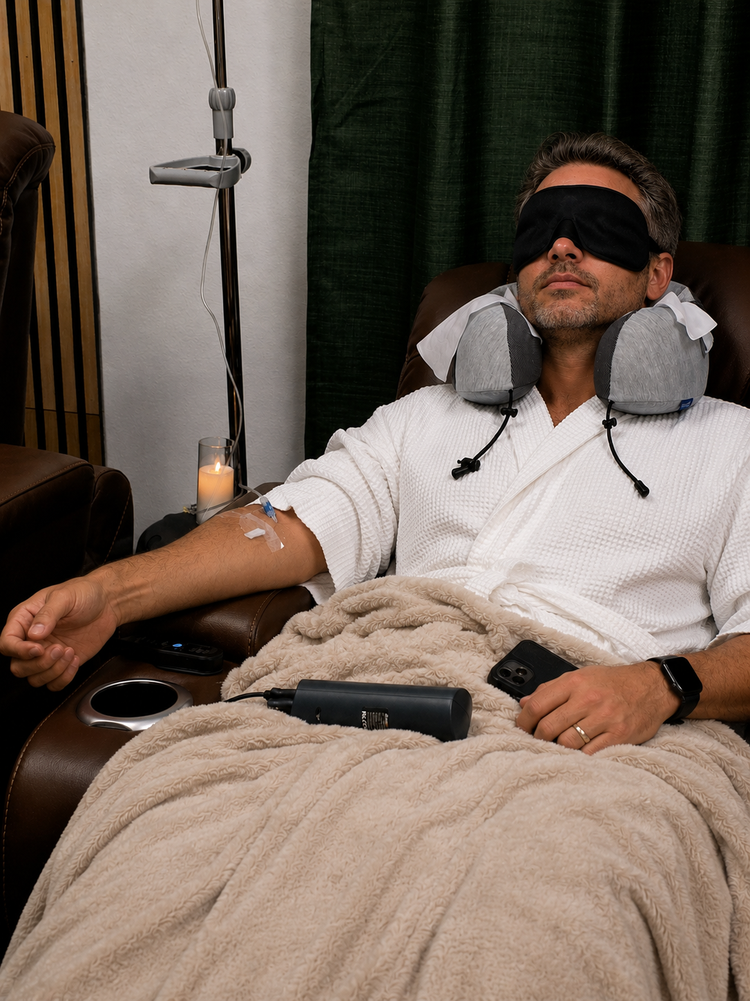 Man relaxing during NAD+ IV therapy session at GlowMD Medical Spa