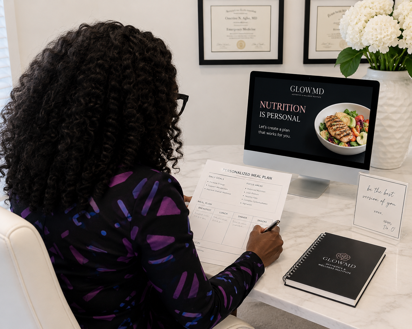 Dr. Omerine creating a personalized nutrition and wellness meal plan at GlowMD in Katy TX