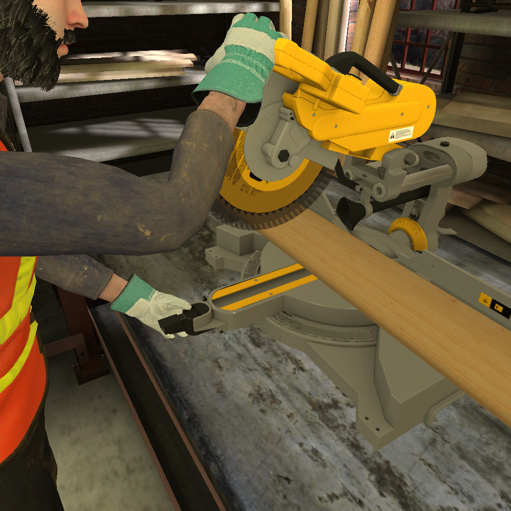 A person using a yellow compound miter saw to cut a piece of wood in a workshop.