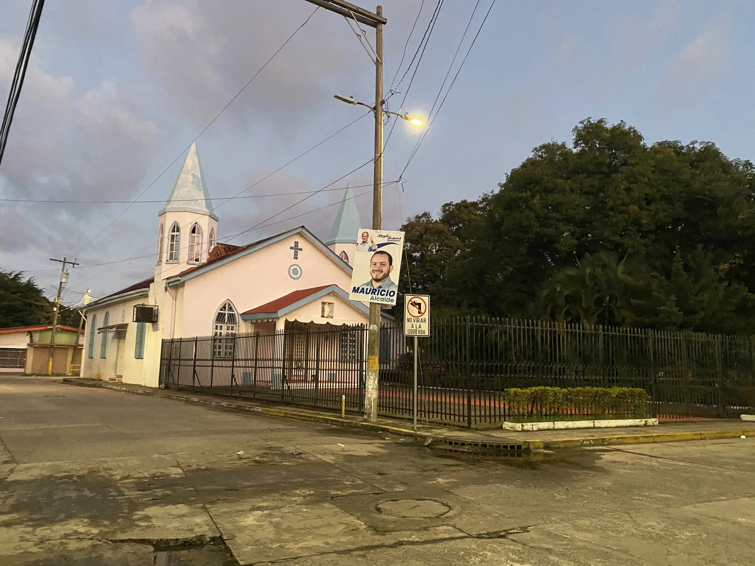 quiet street in La Ceiba Honduras at dusk travel safety solo female travel environment