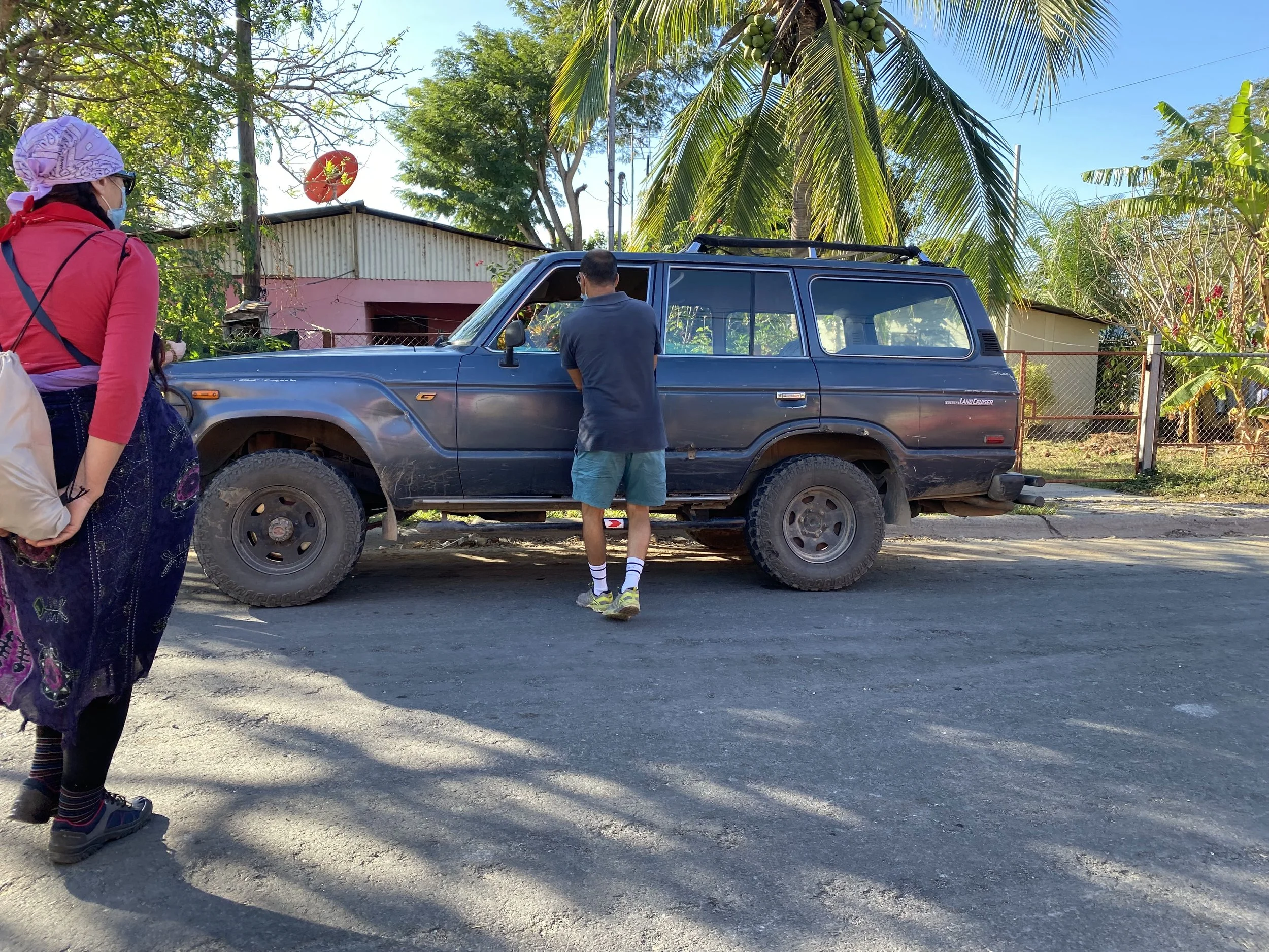 Traveller boarding a 4x4 vehicle for a day trip near Liberia, Costa Rica
